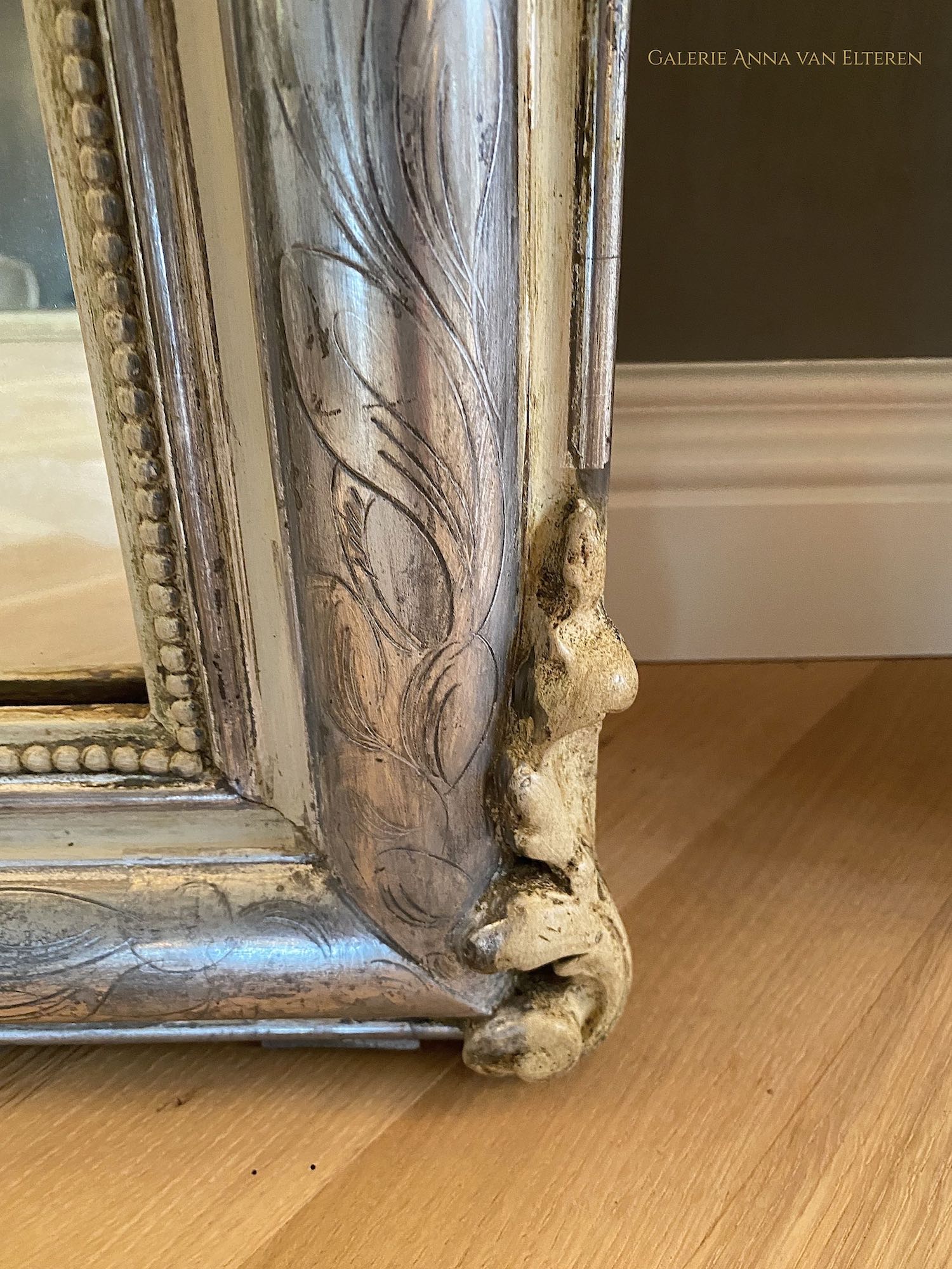 19th c. silver leaf gilded French mirror with a crown