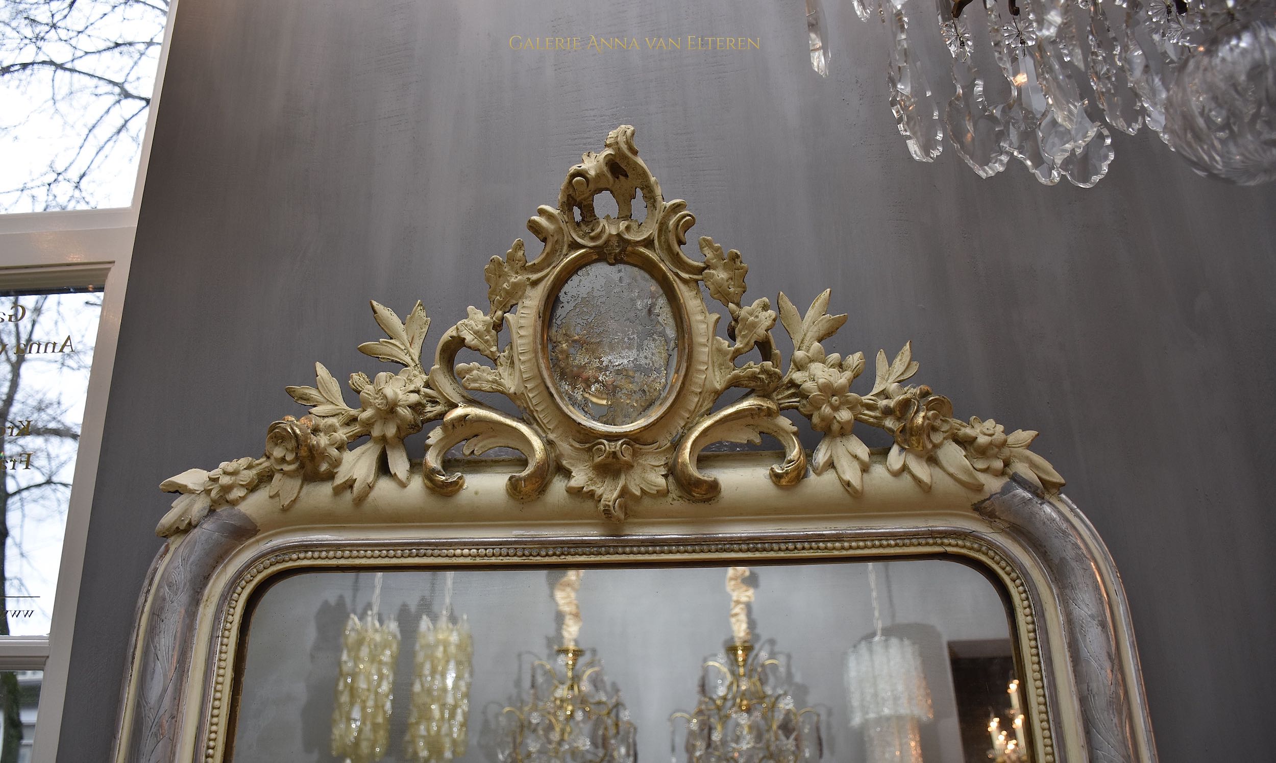 19th c. silver leaf gilded French mirror with a crown