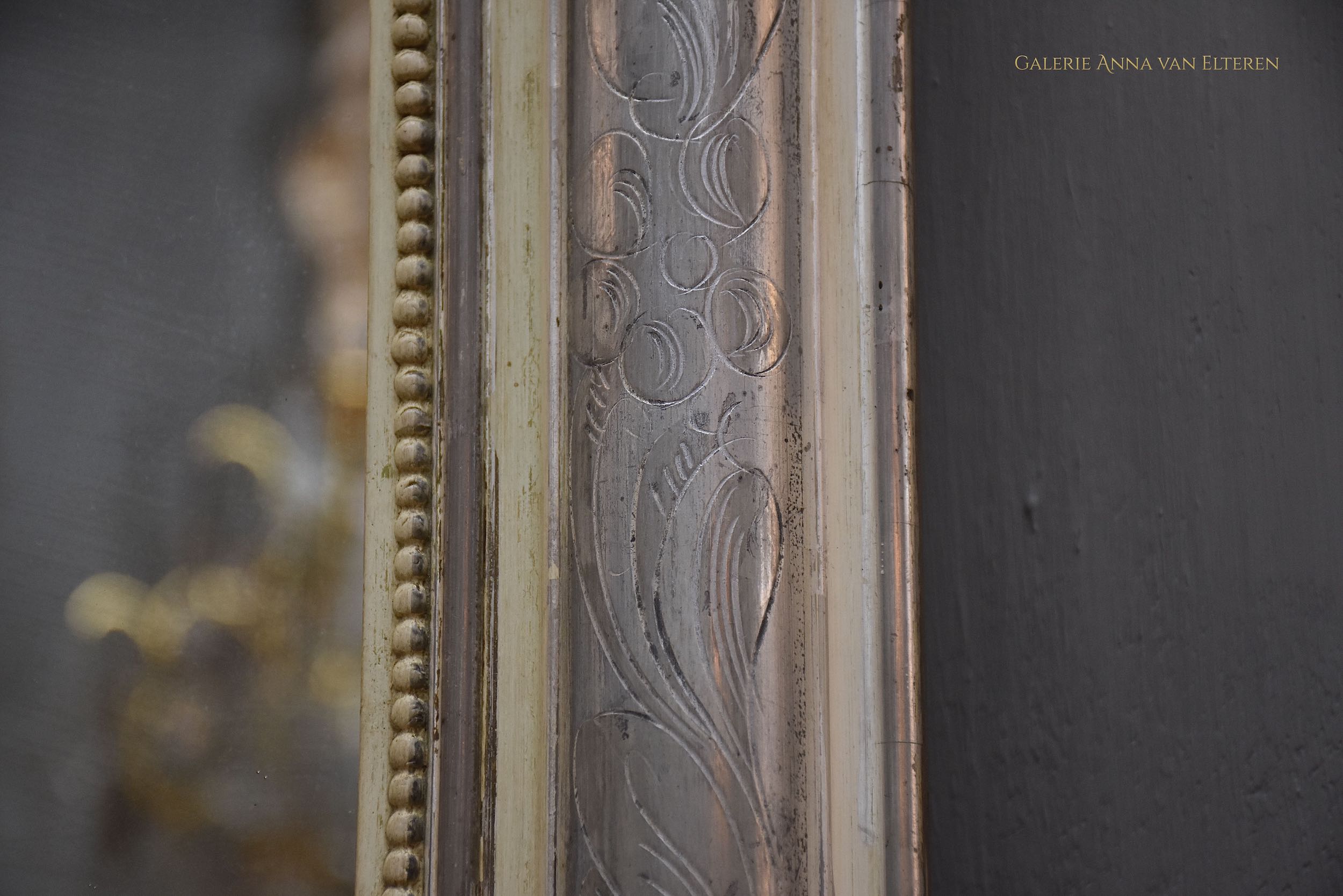 19th c. silver leaf gilded French mirror with a crown