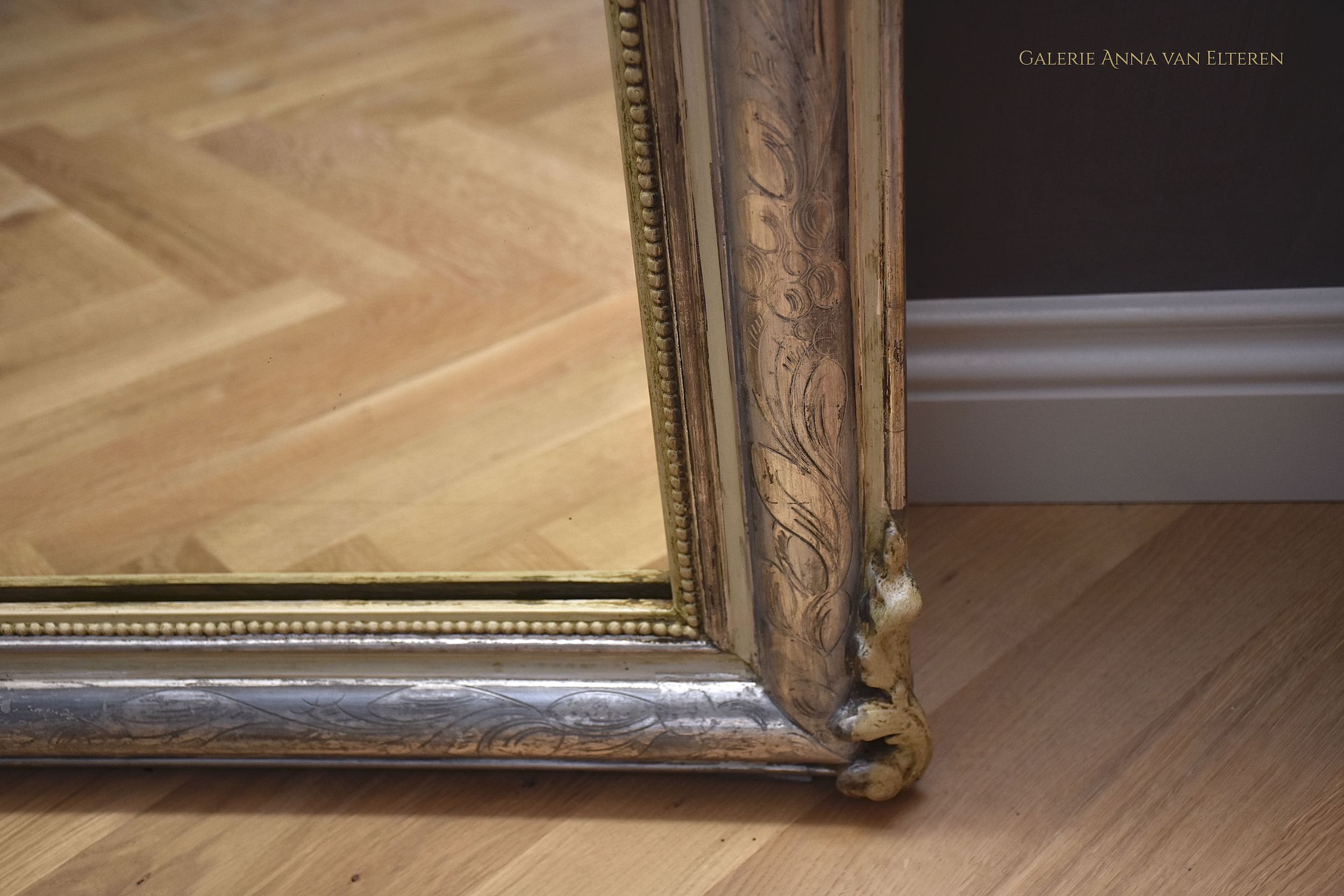 19th c. silver leaf gilded French mirror with a crown