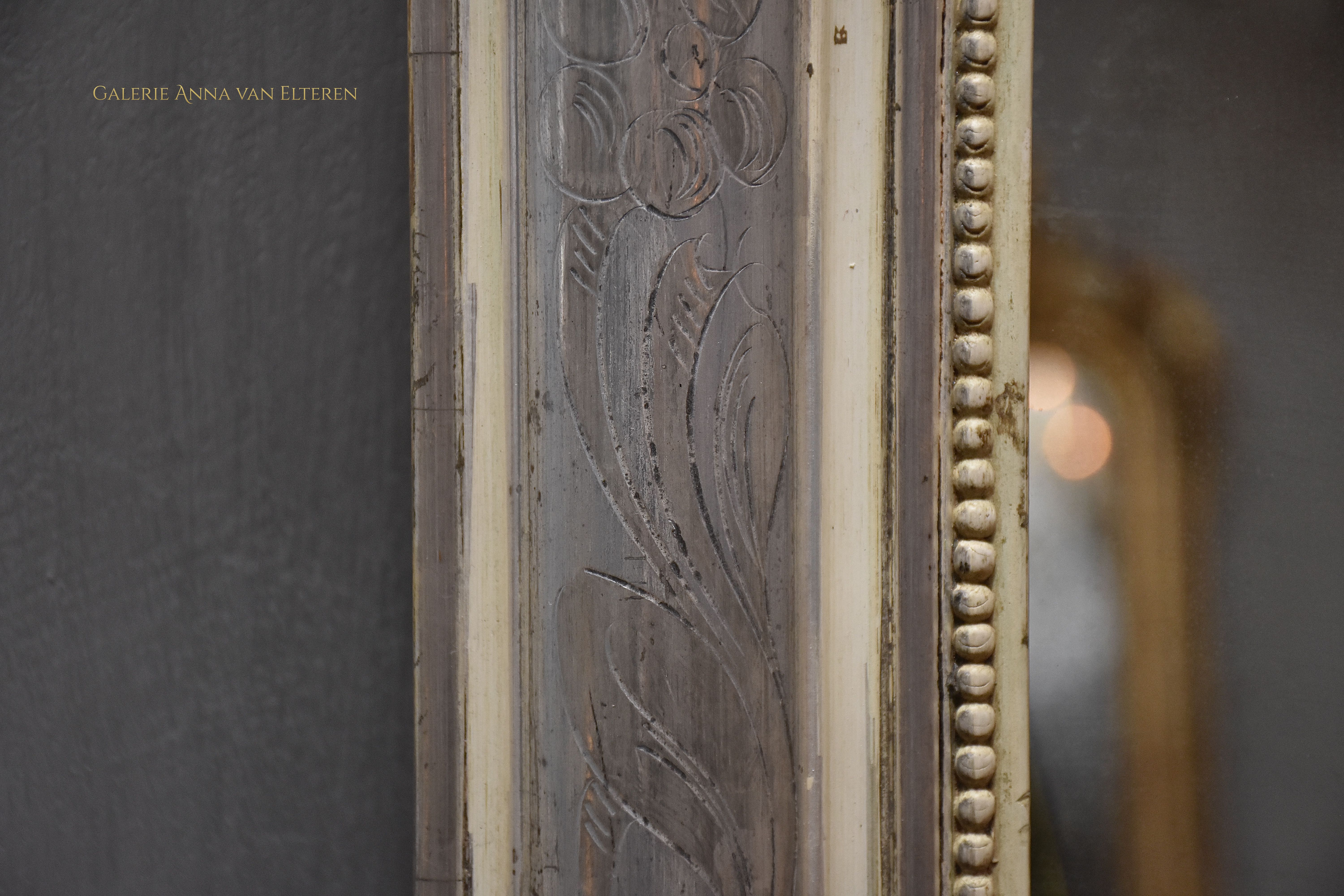 19th c. silver leaf gilded French mirror with a crown