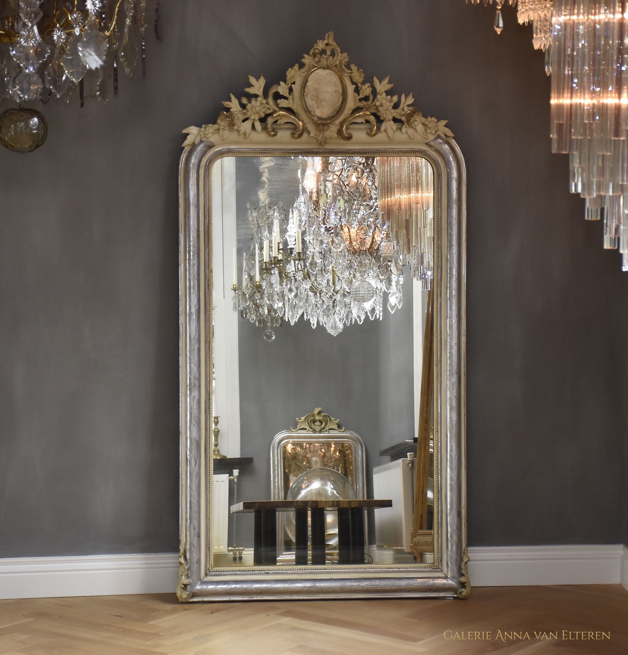 19th c. silver leaf gilded French mirror with a crown