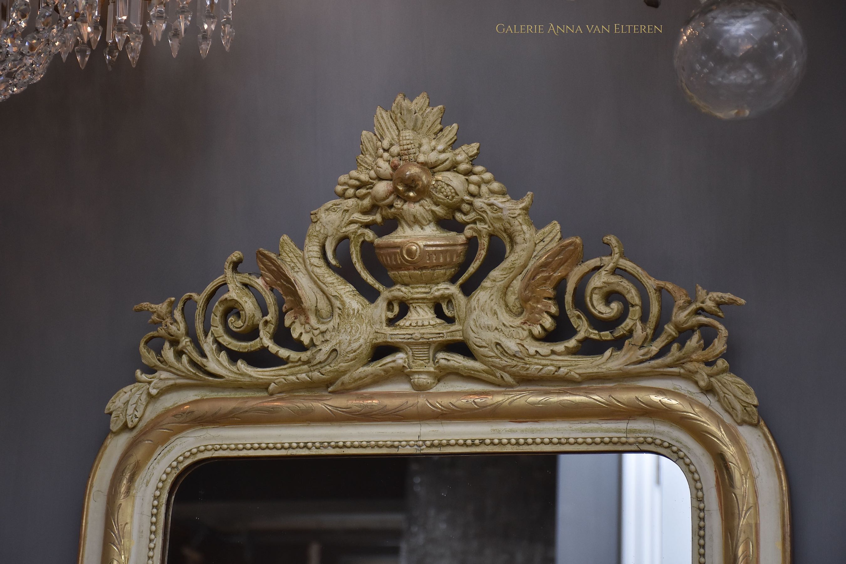 19th c. French mirror with an impressive crest