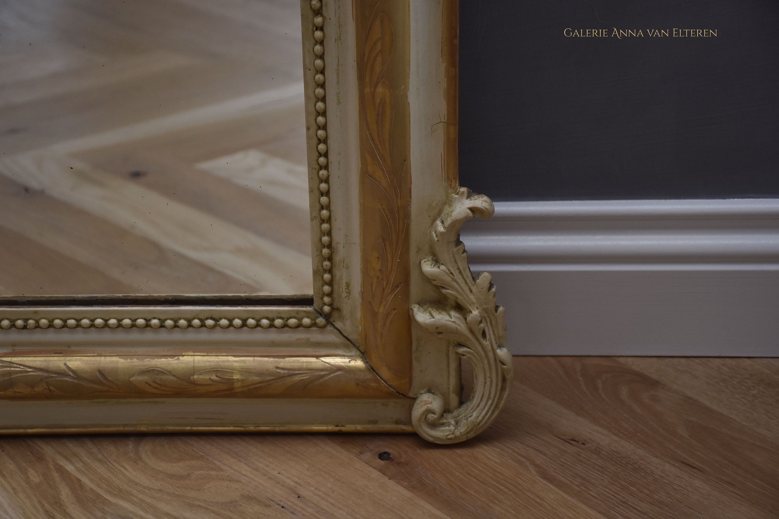 19th c. French mirror with an impressive crest