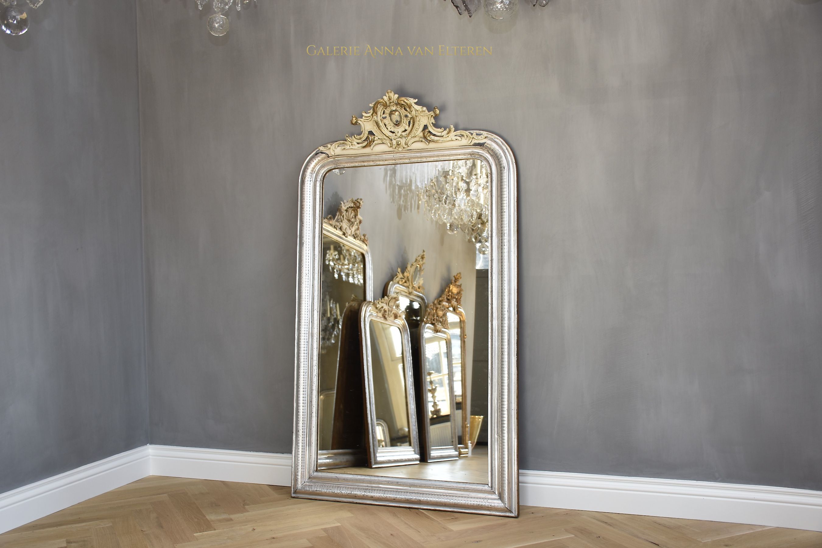 Large antique French mirror Louis-Philippe with a crest