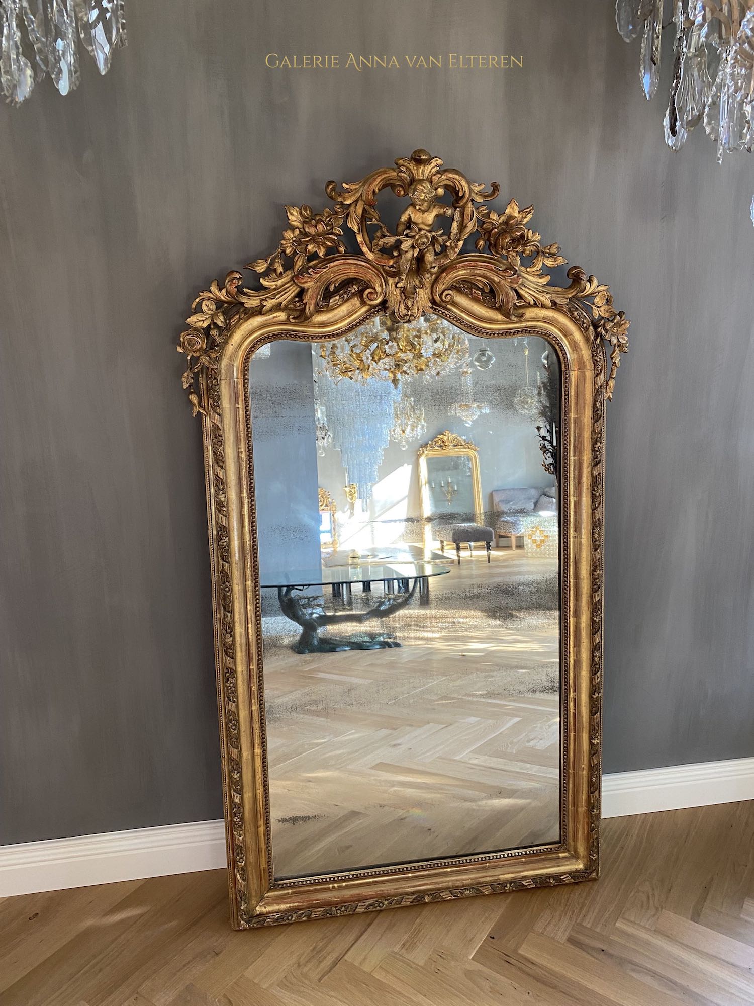 19th c. large impressive French mirror with a fabulous crown and putti