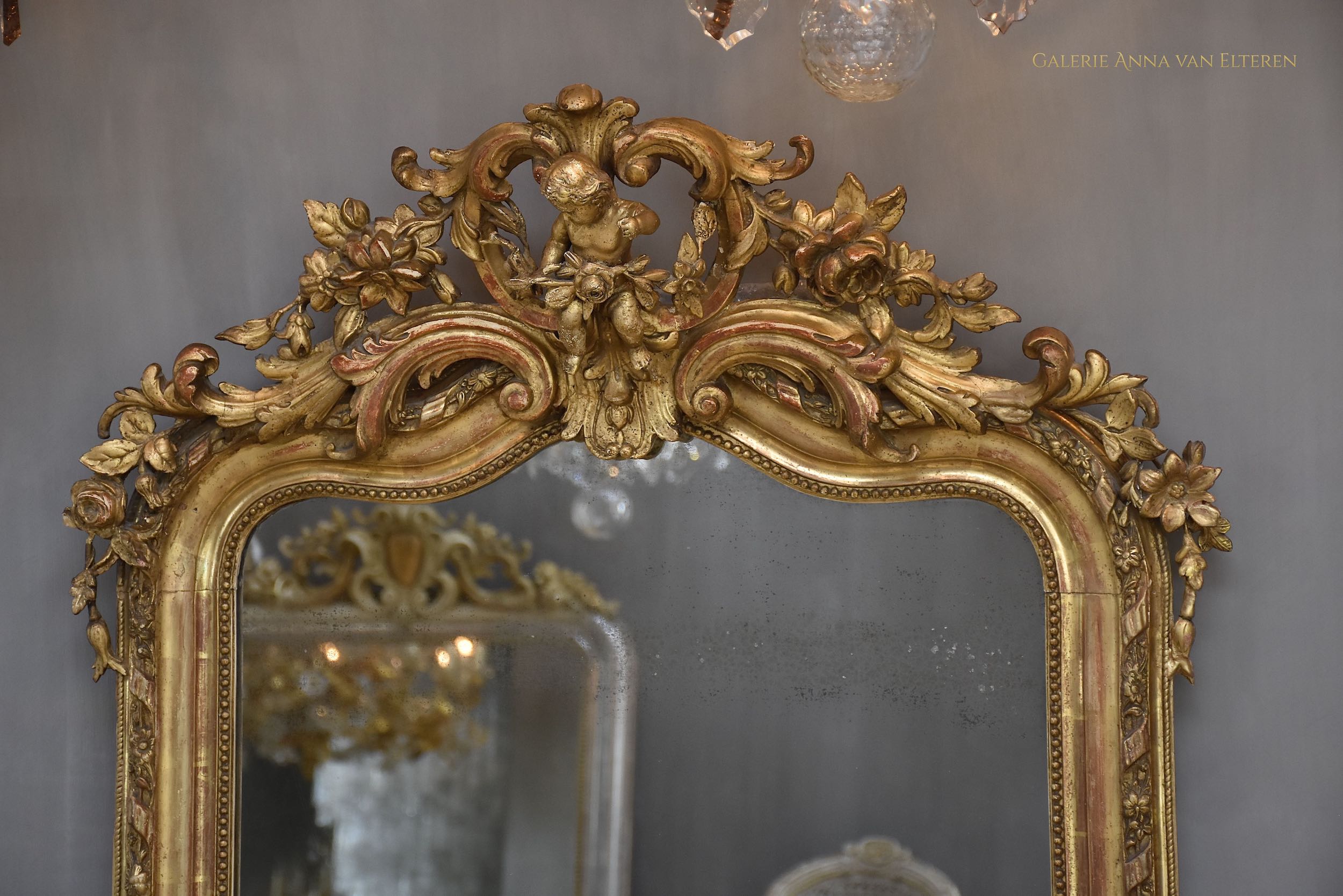 19th c. large impressive French mirror with a fabulous crown and putti