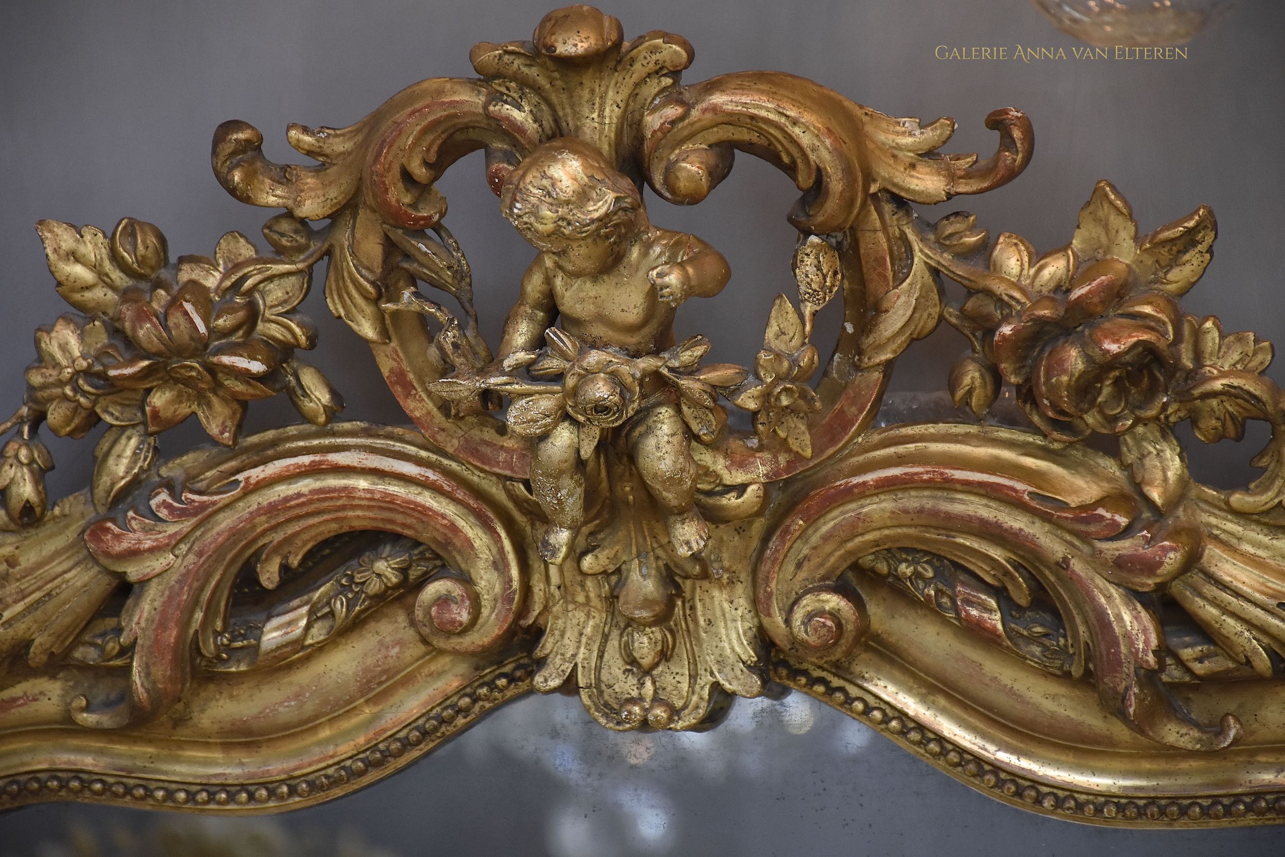 19th c. large impressive French mirror with a fabulous crown and putti