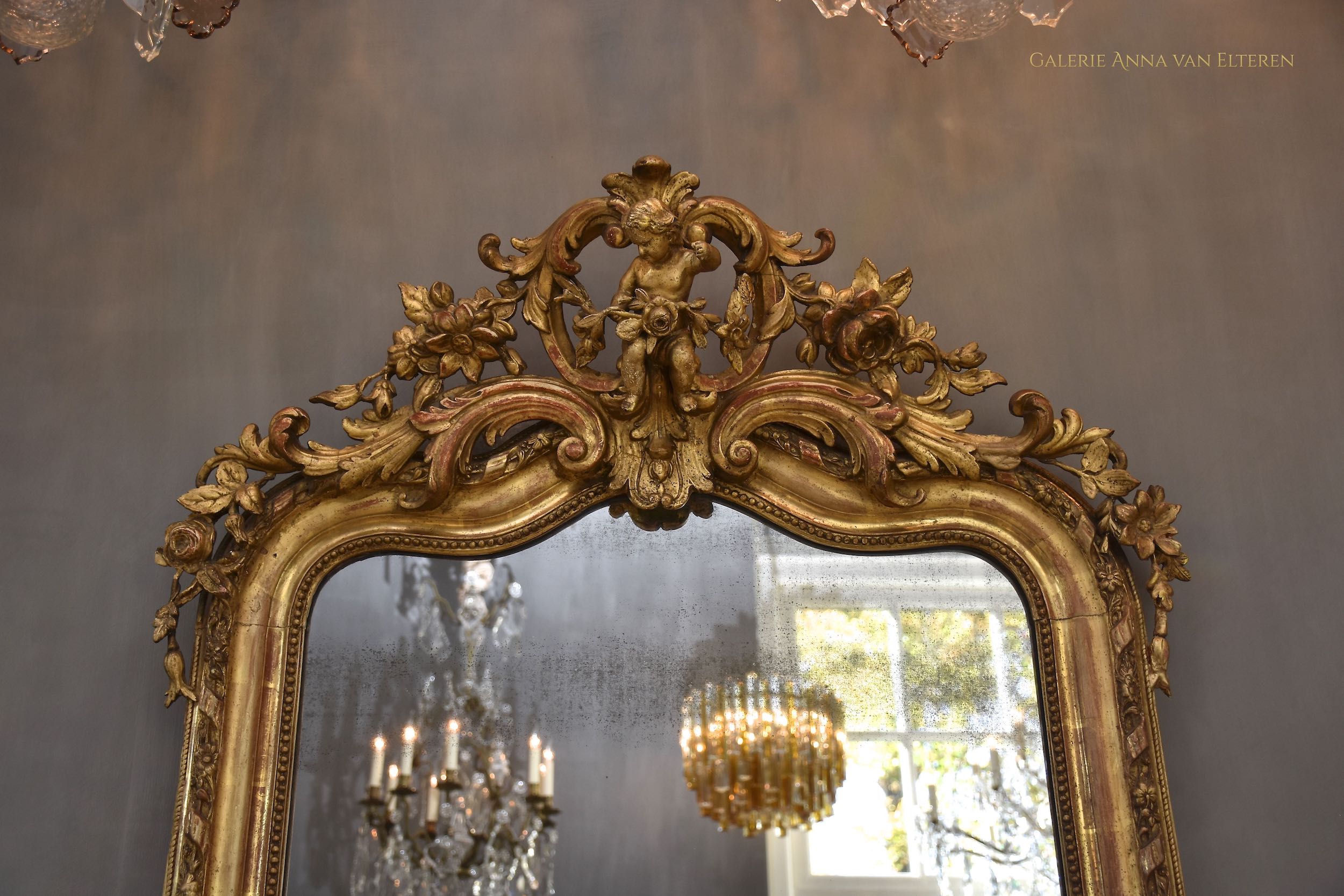 19th c. large impressive French mirror with a fabulous crown and putti