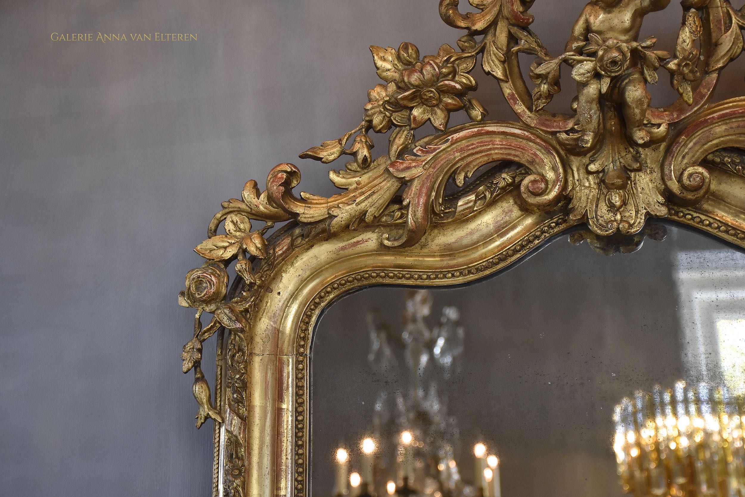 19th c. large impressive French mirror with a fabulous crown and putti