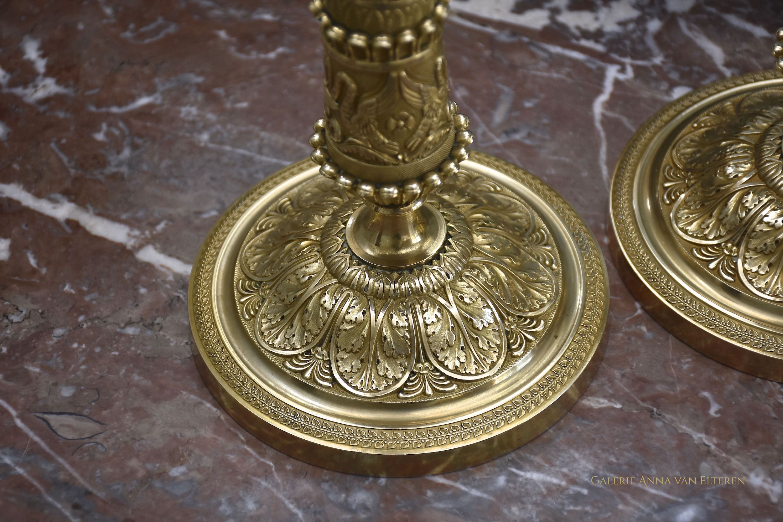 A fine pair of 19th c. gilt and chased bronze candlesticks