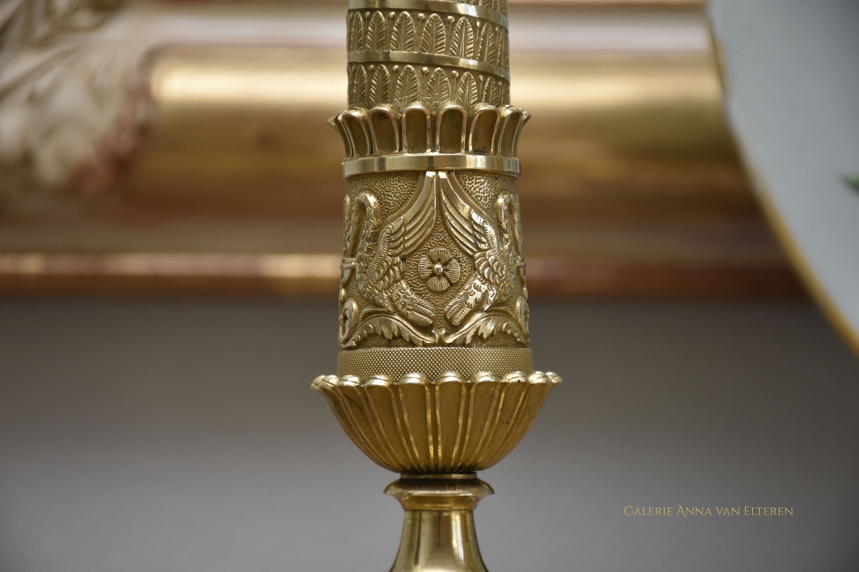 A fine pair of 19th c. gilt and chased bronze candlesticks