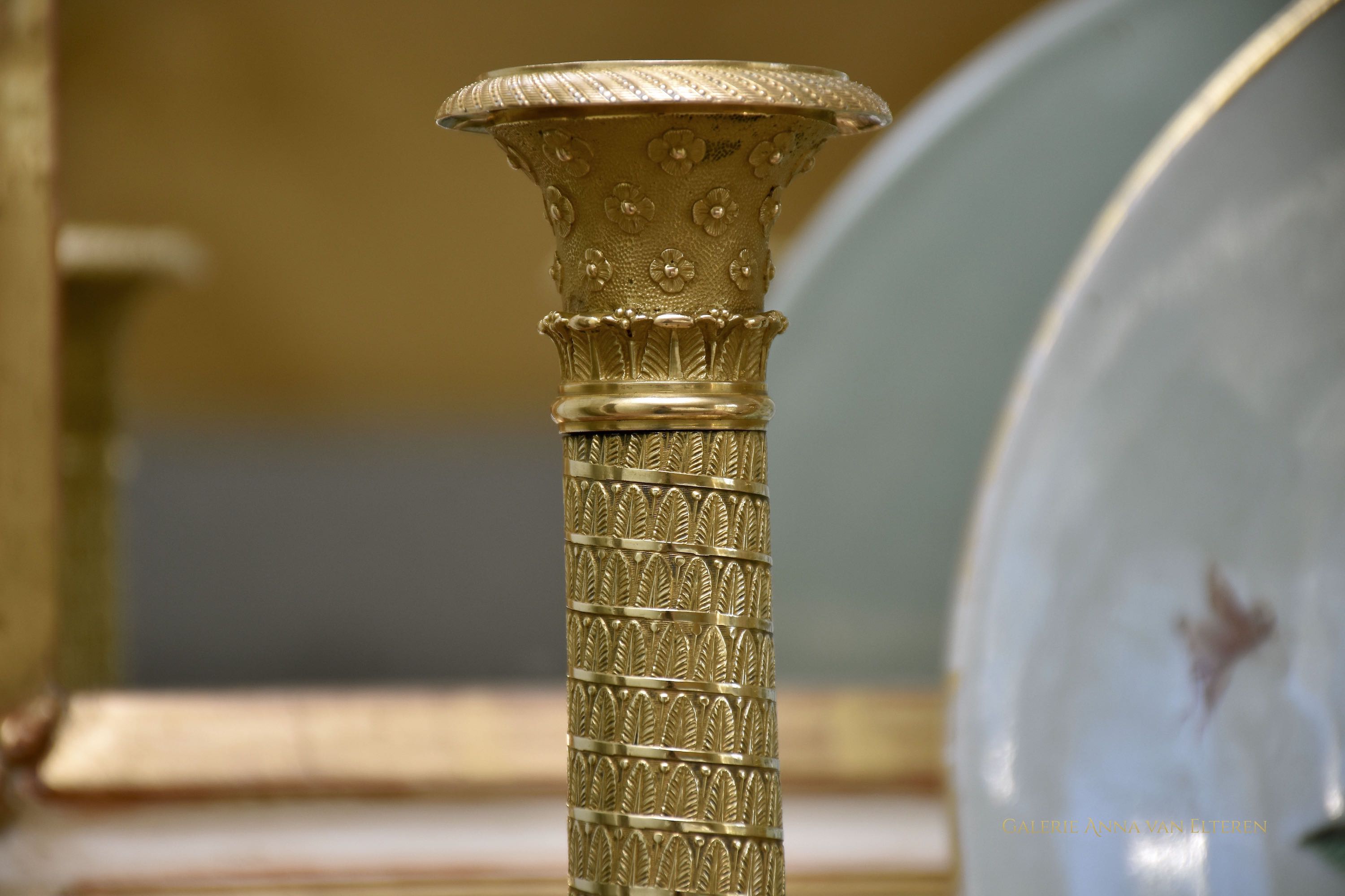 A fine pair of 19th c. gilt and chased bronze candlesticks