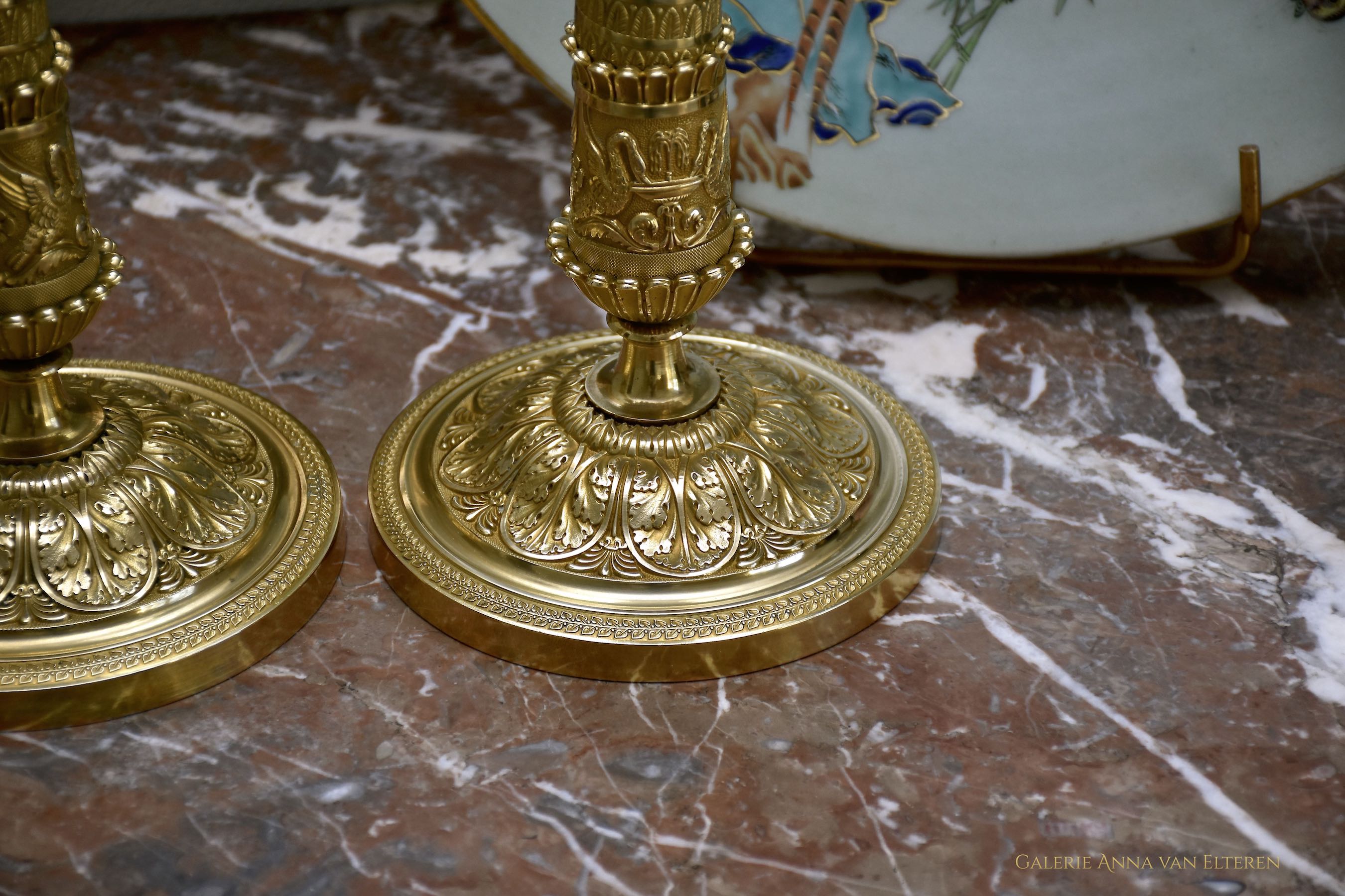 A fine pair of 19th c. gilt and chased bronze candlesticks