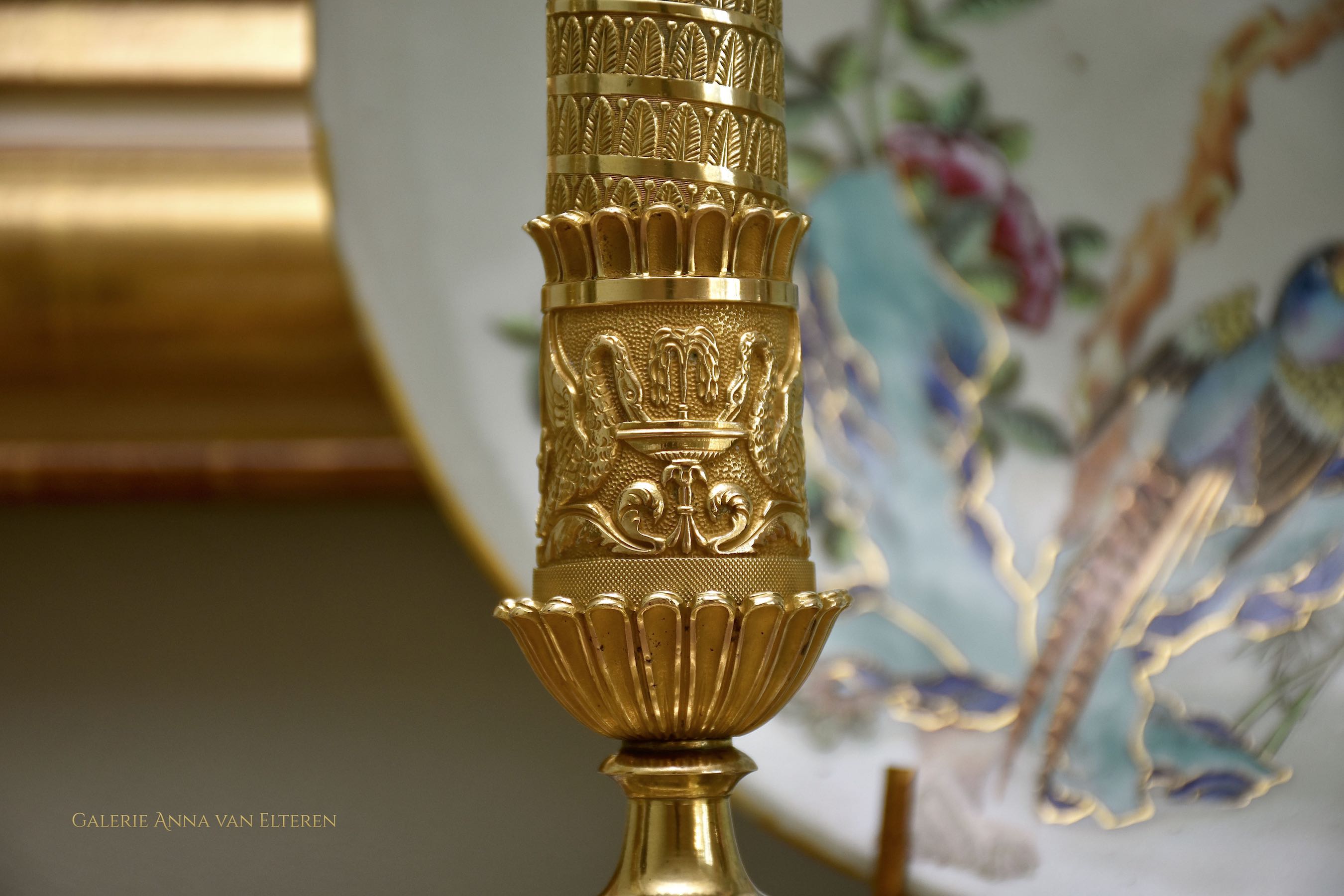 A fine pair of 19th c. gilt and chased bronze candlesticks