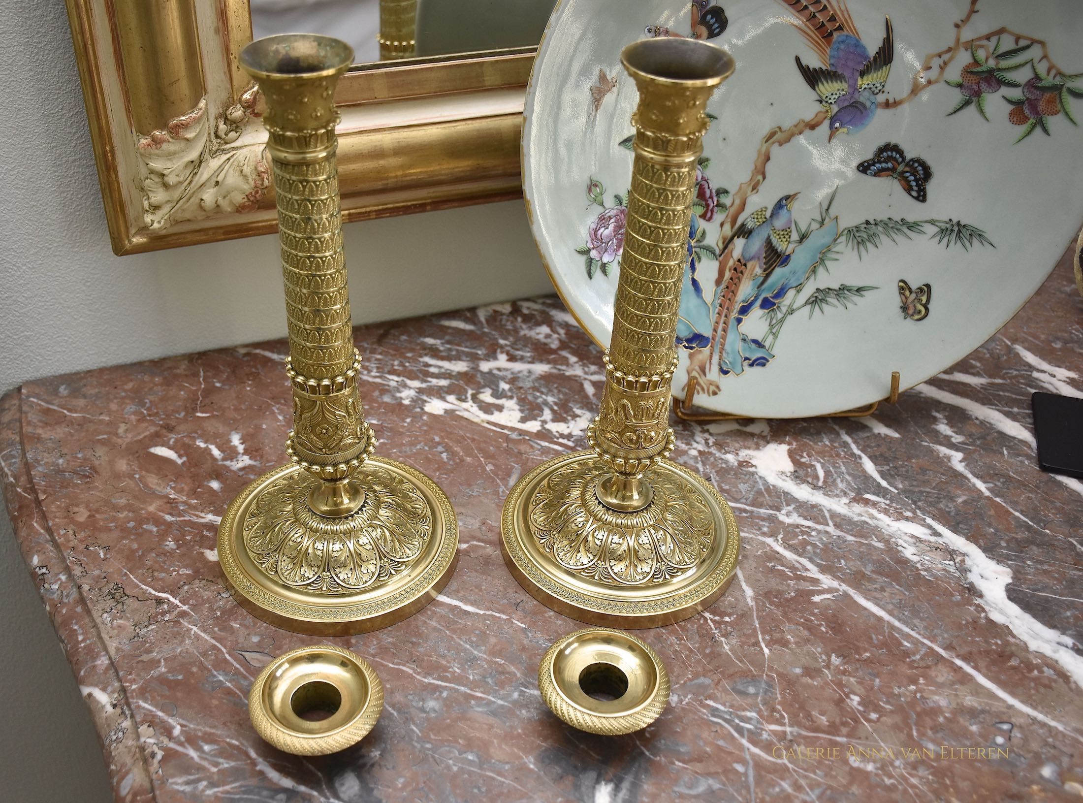 A fine pair of 19th c. gilt and chased bronze candlesticks