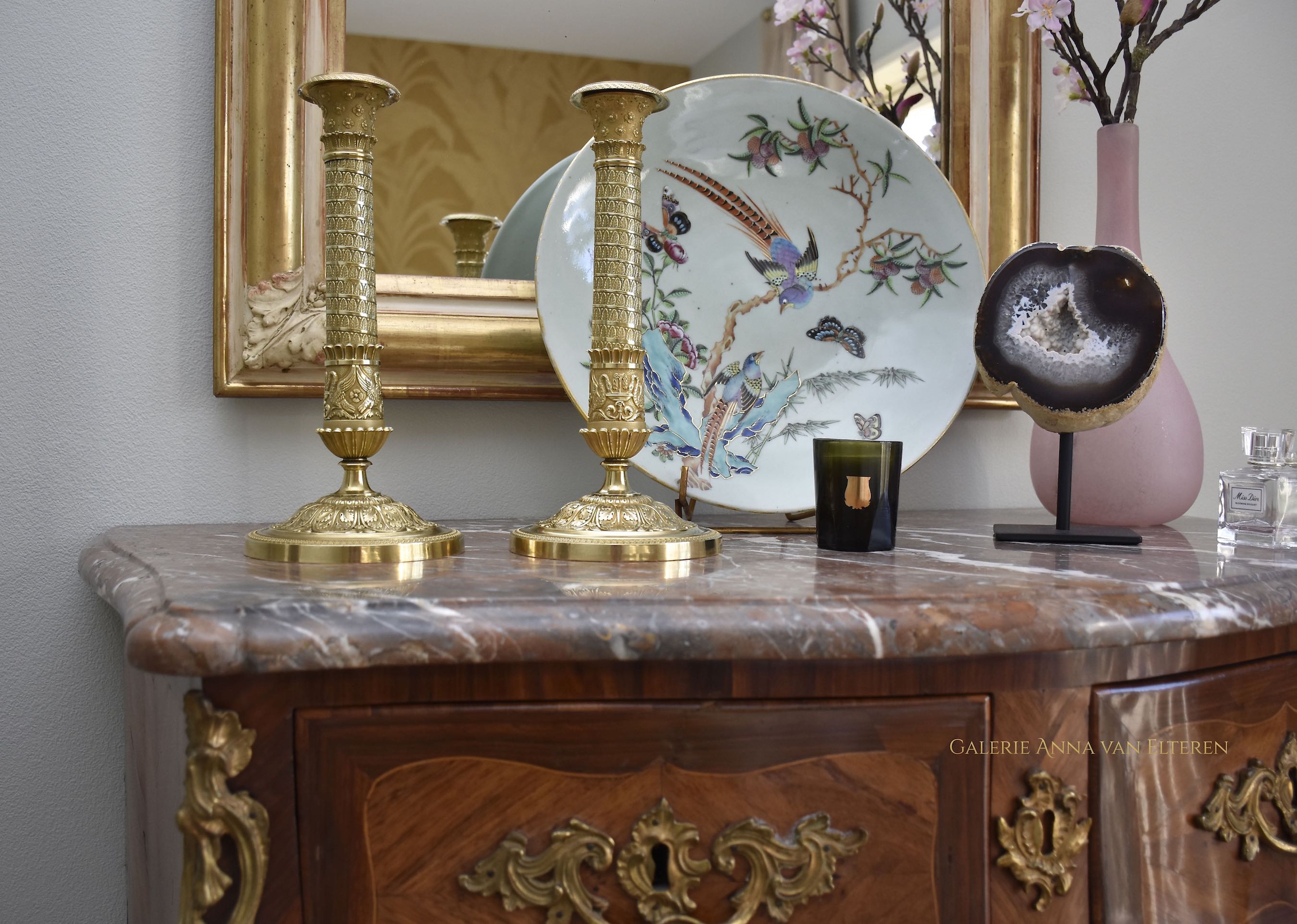 A fine pair of 19th c. gilt and chased bronze candlesticks