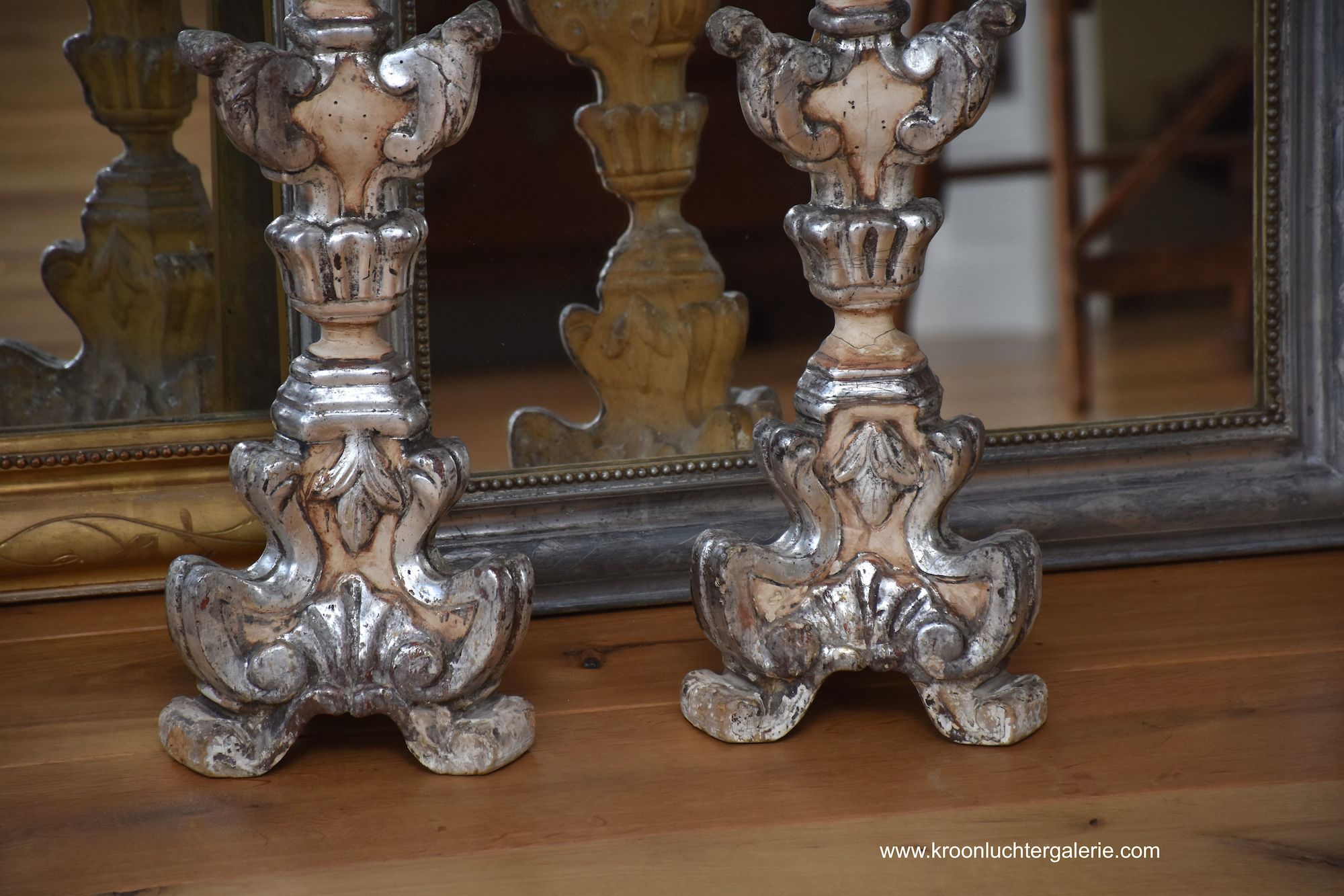 A pair of 19th century carved and gilded Italian torcheres