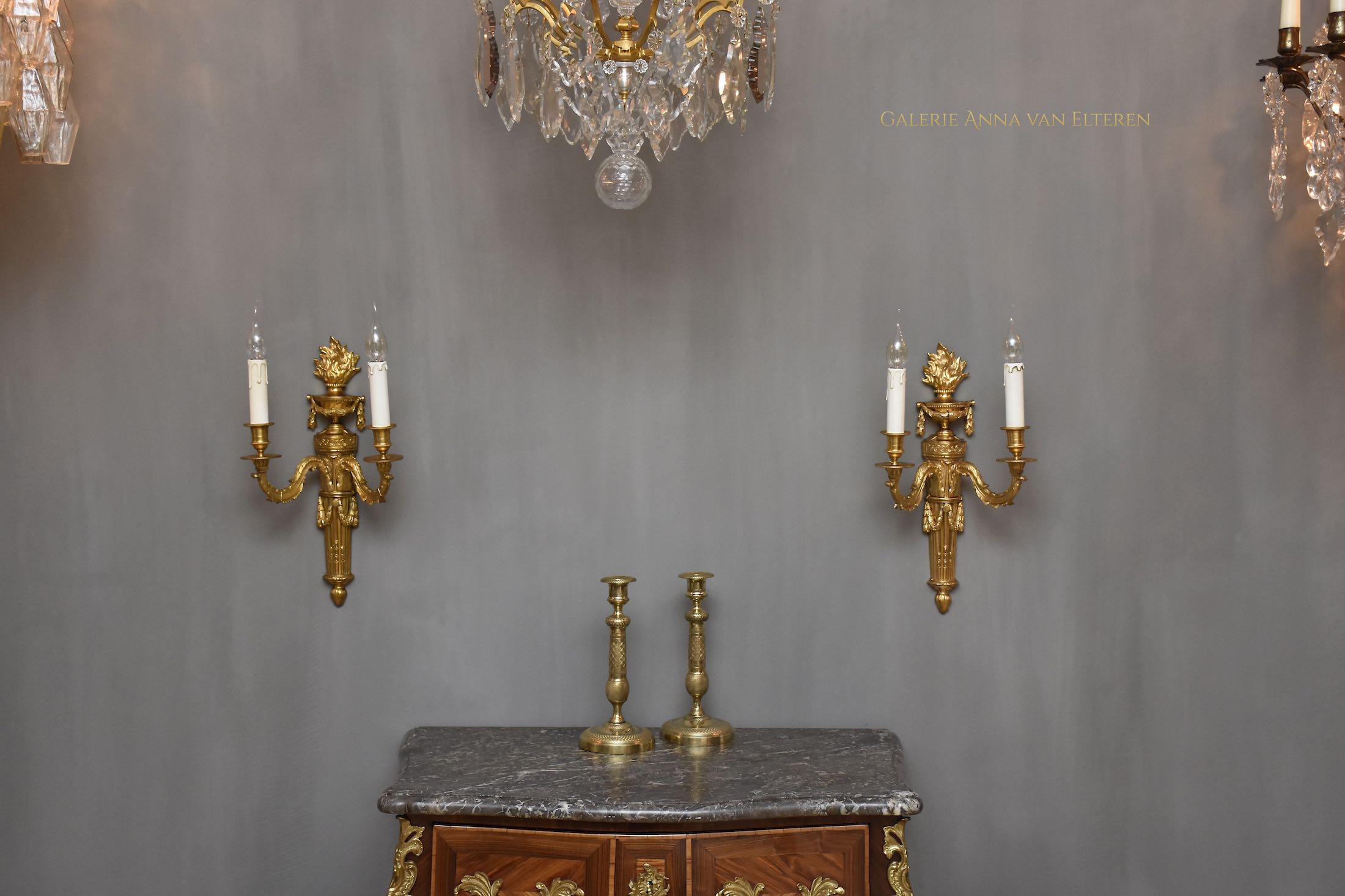 A pair of large gilt bronze French wall appliques in the style of Louis XVI
