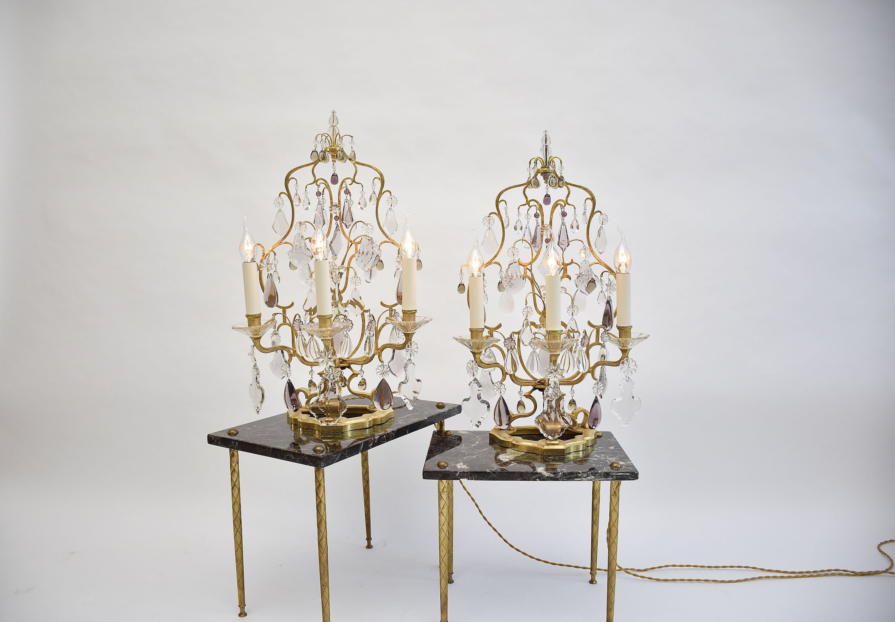 A pair of large French crystal girandoles