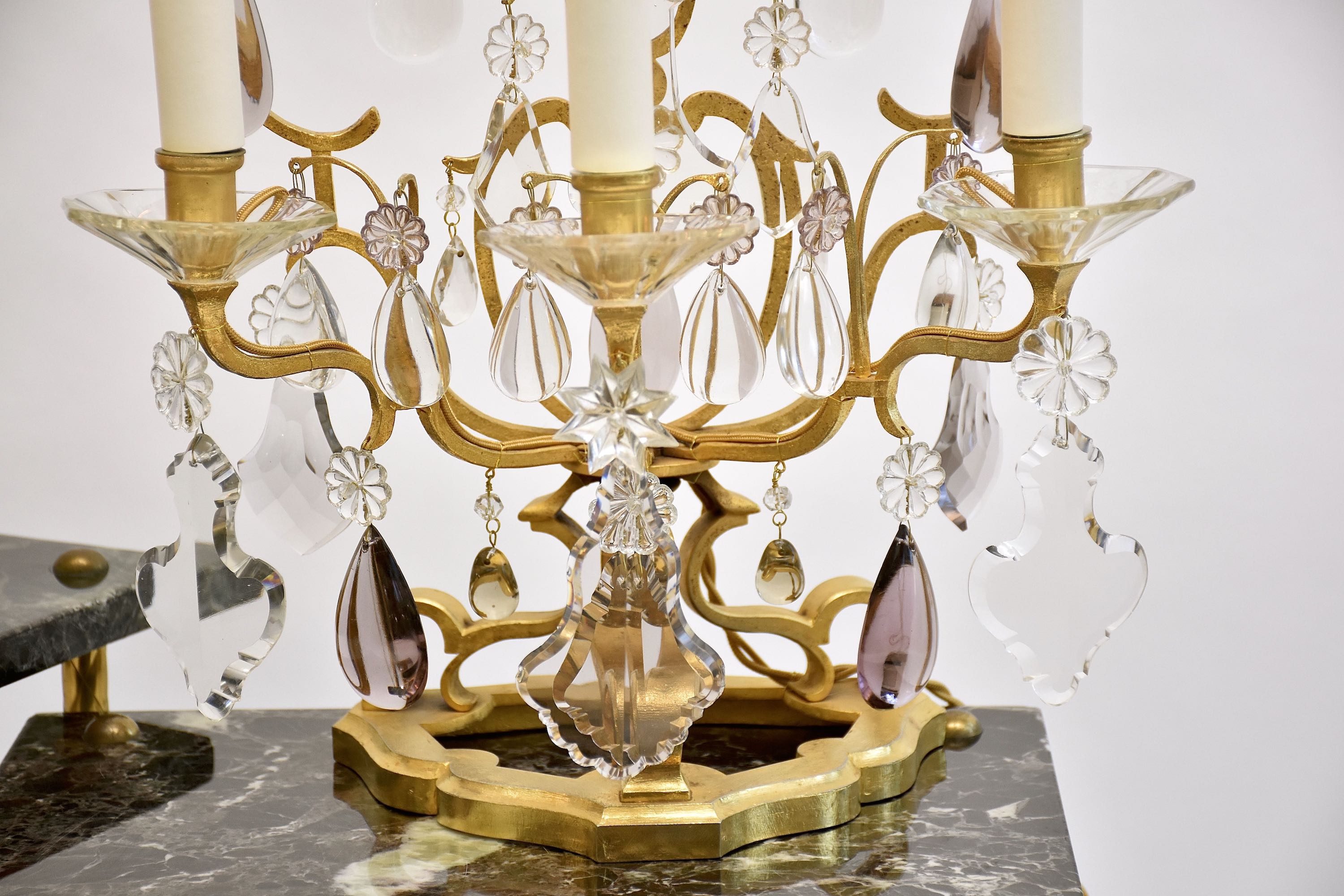 A pair of large French crystal girandoles