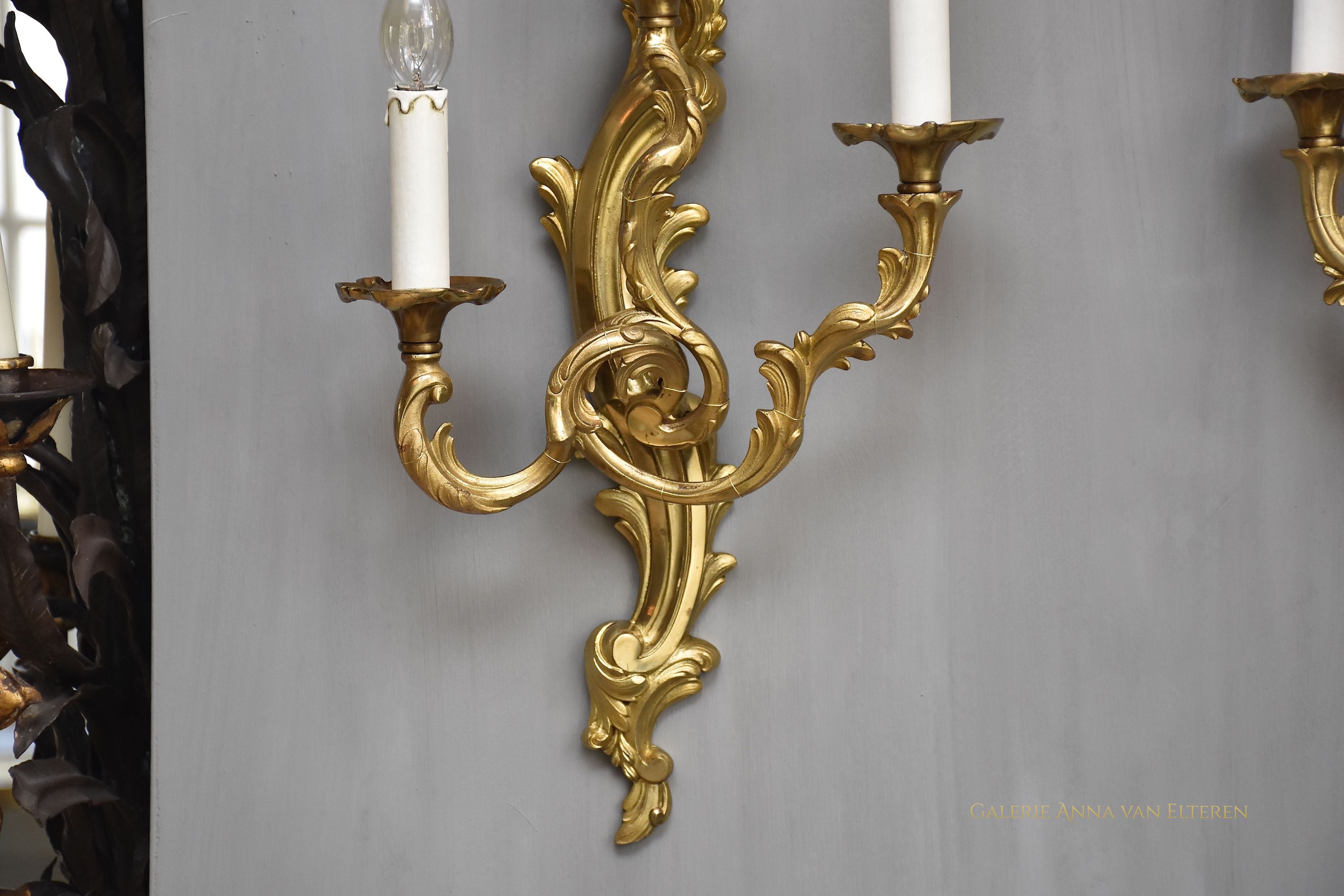 A pair of gilt bronze French wall lights