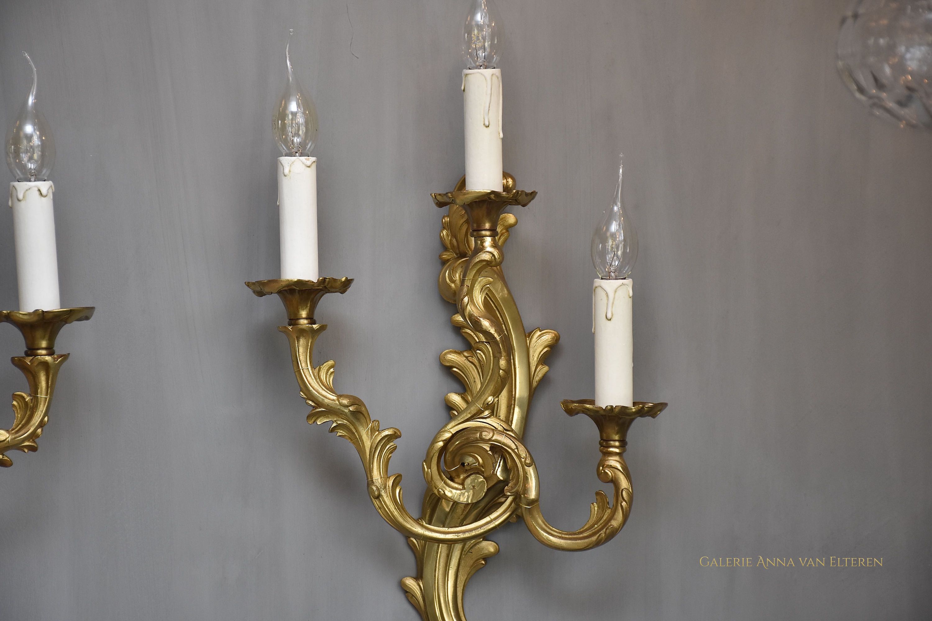 A pair of gilt bronze French wall lights