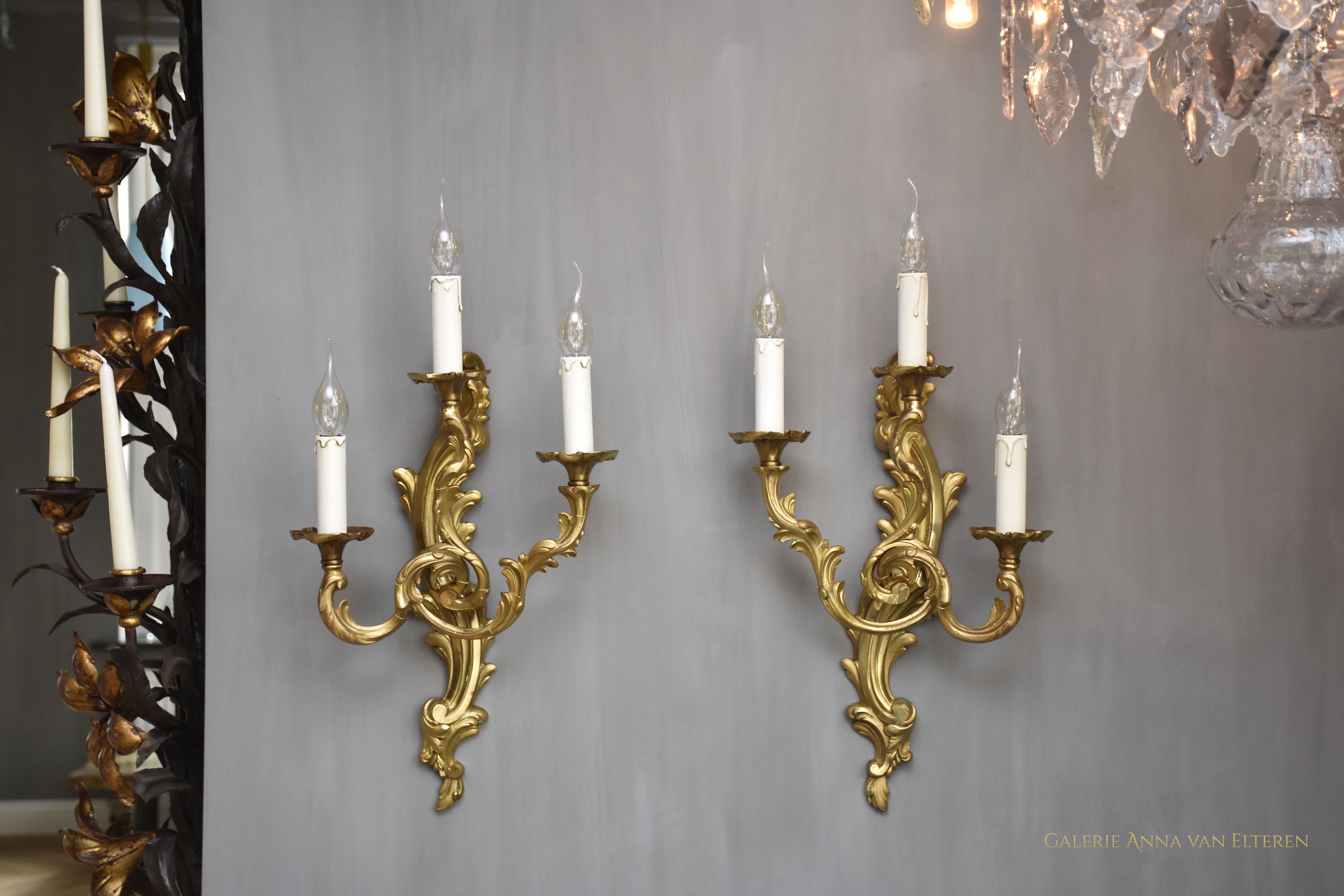 A pair of gilt bronze French wall lights