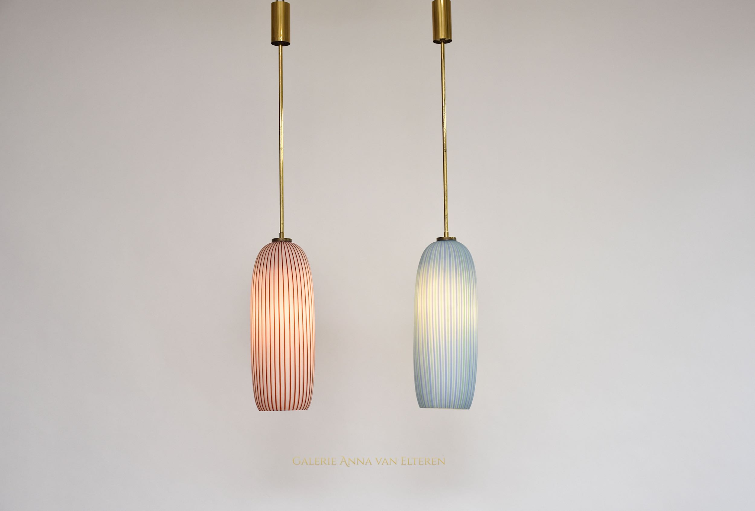 A pair of mid-century Murano pendants by Vistosi