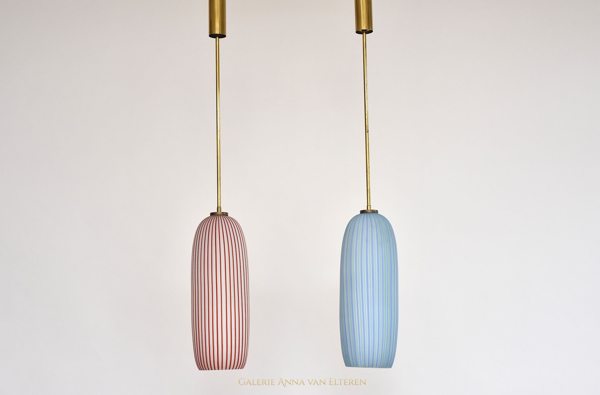 A pair of mid-century Murano pendants by Vistosi