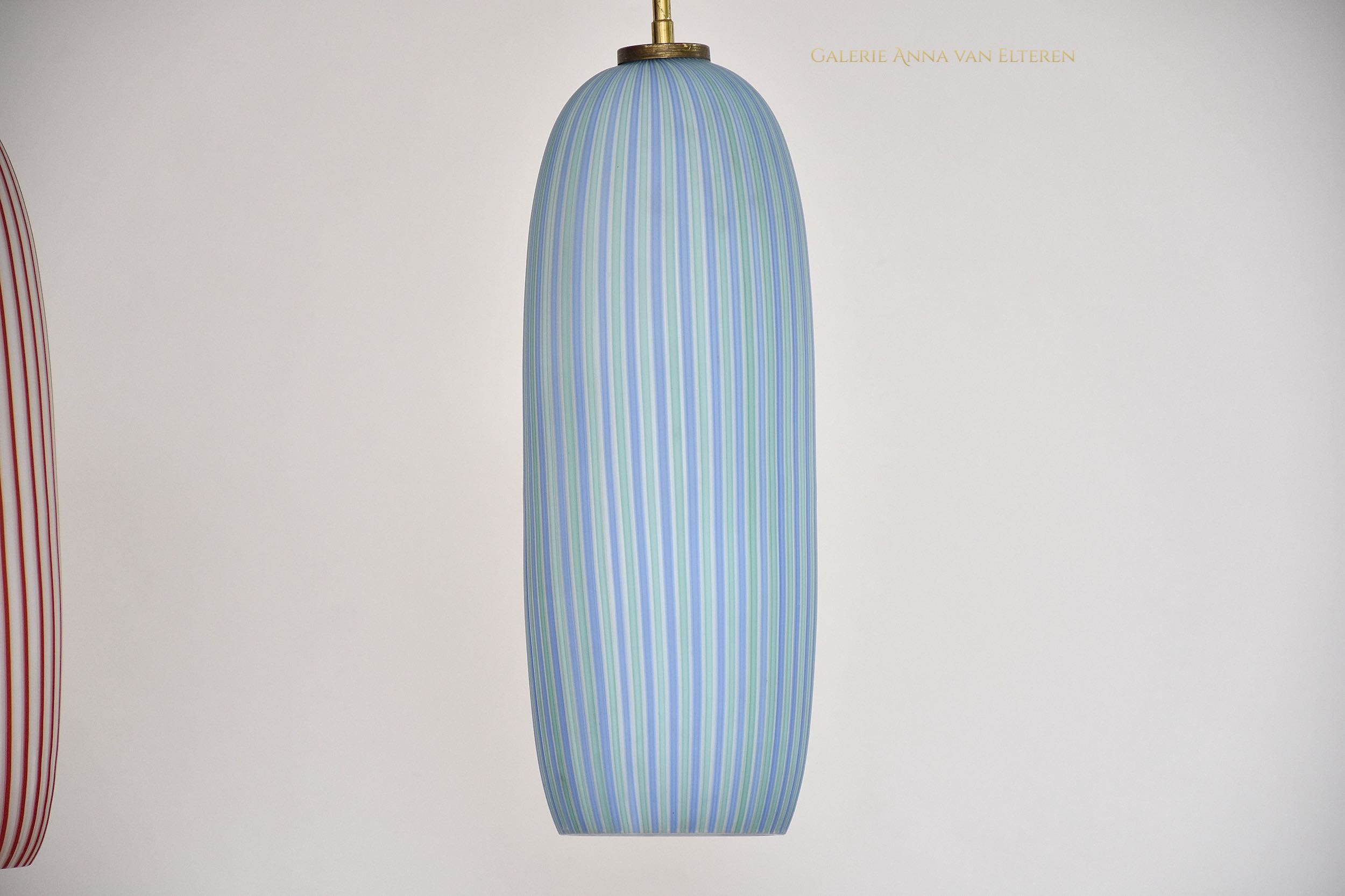 A pair of mid-century Murano pendants by Vistosi