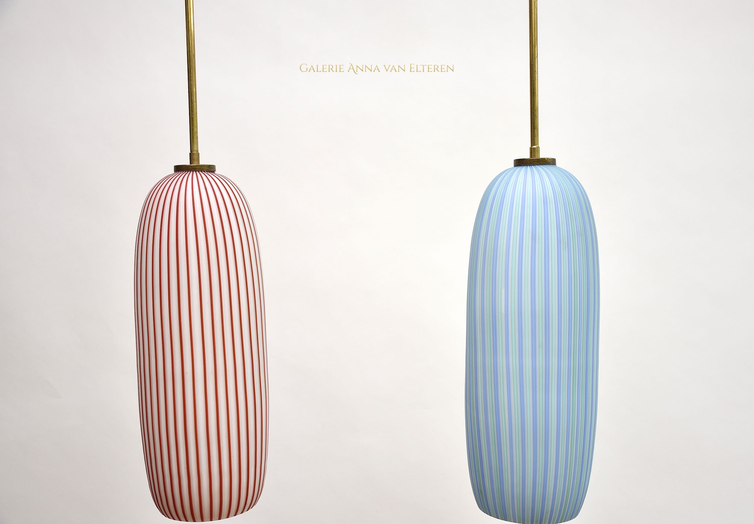 A pair of mid-century Murano pendants by Vistosi