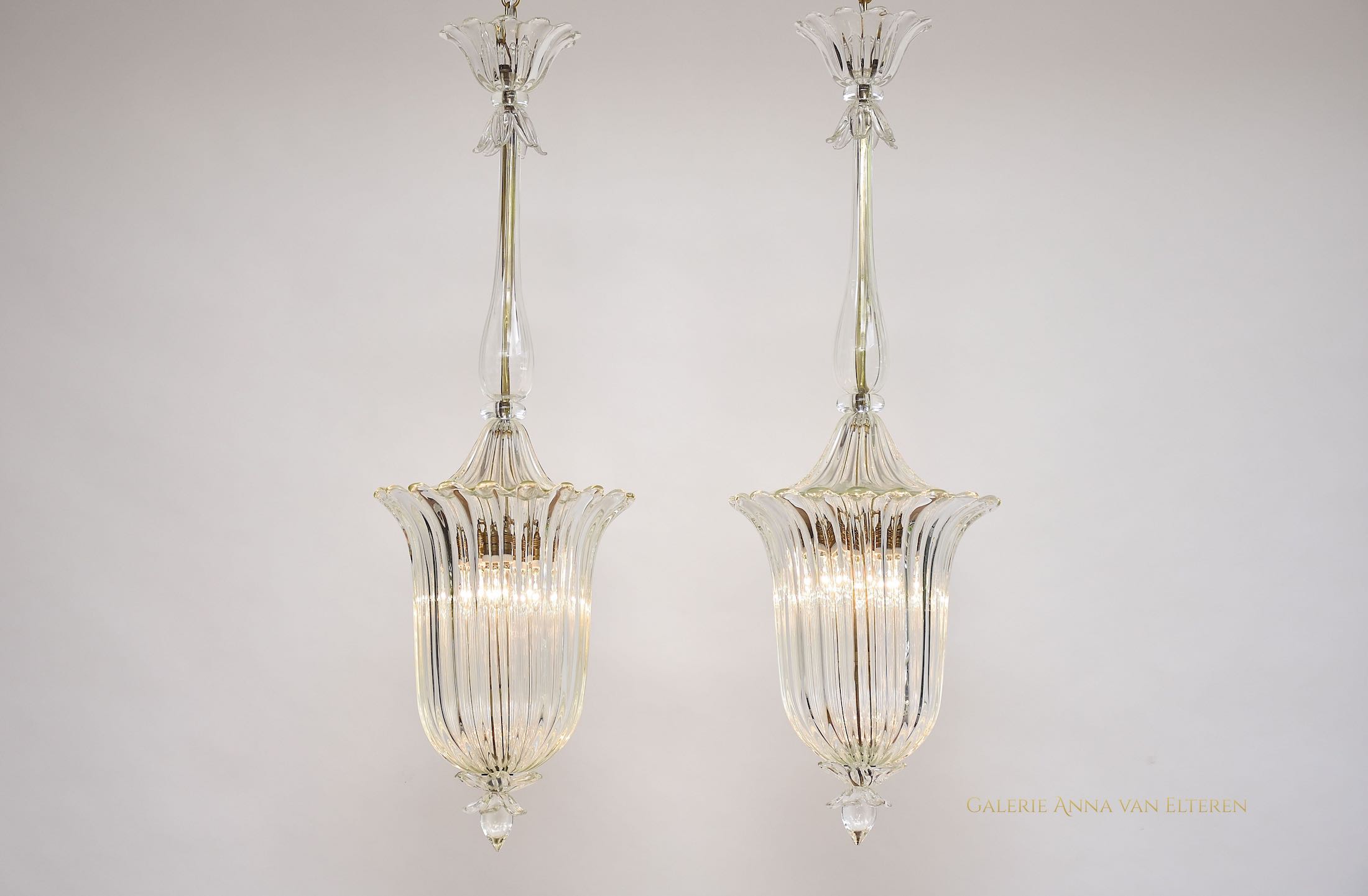 A pair of Seguso Murano glass and brass lantern/ pendants