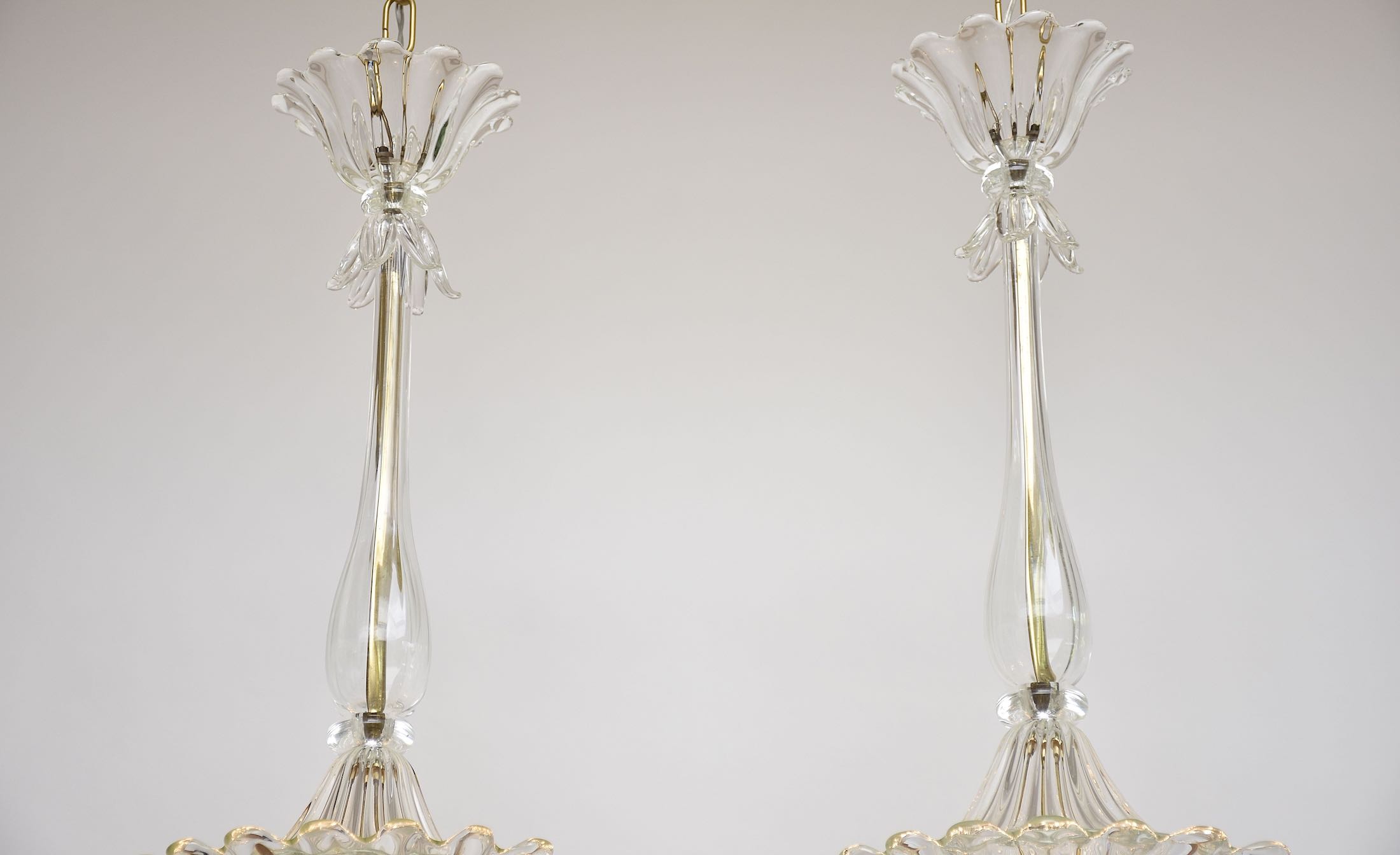 A pair of Seguso Murano glass and brass lantern/ pendants