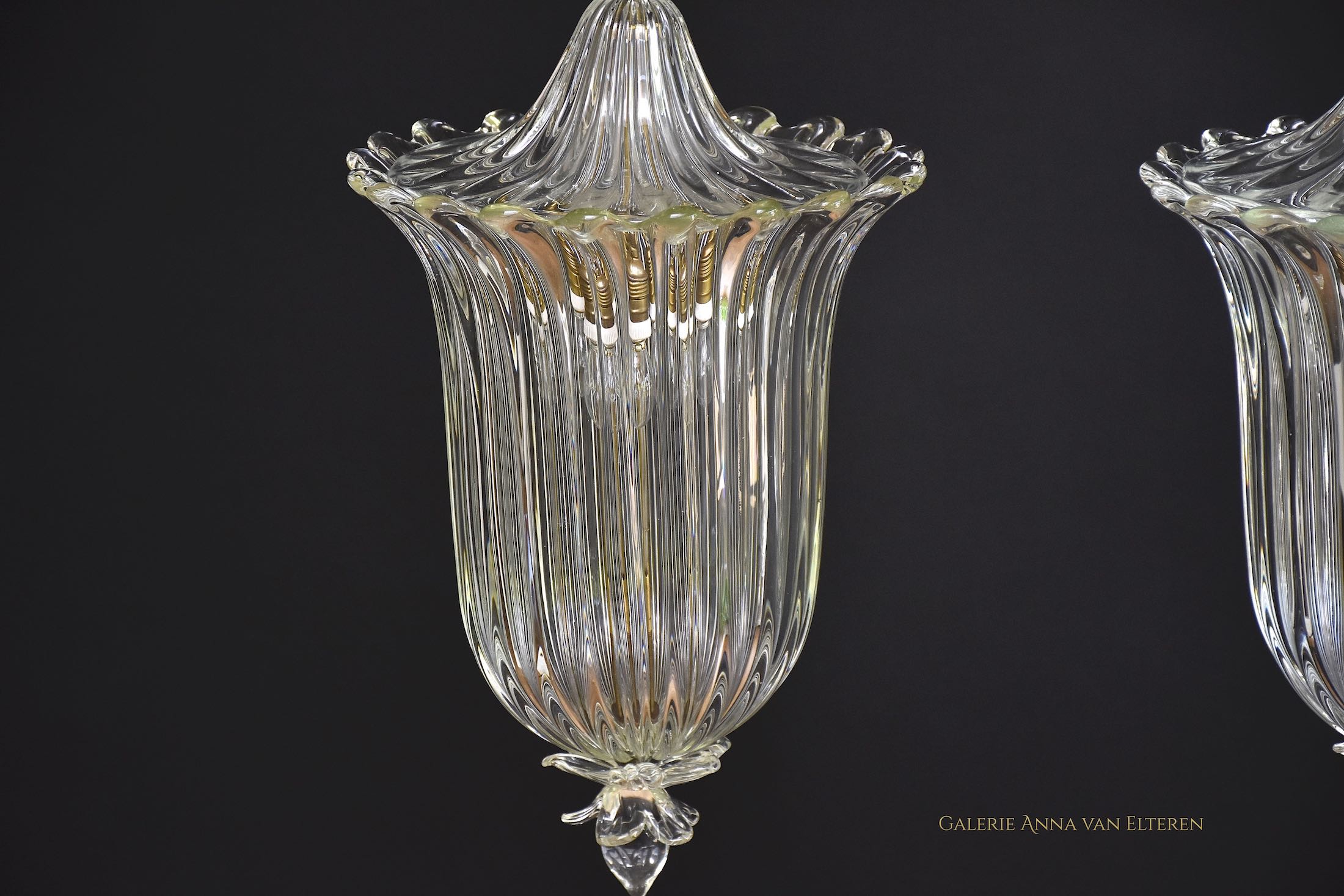 A pair of Seguso Murano glass and brass lantern/ pendants