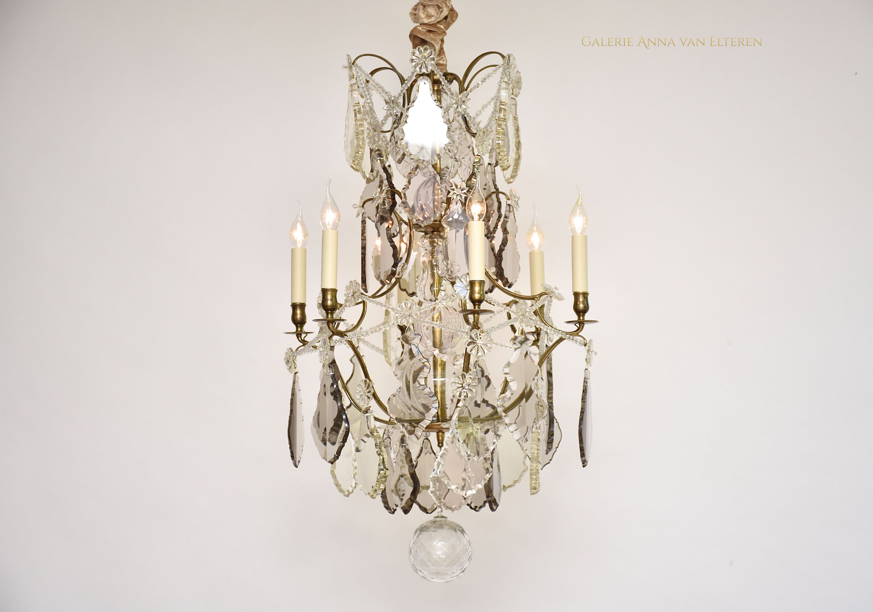 Antique crystal chandelier in the style of Rococo