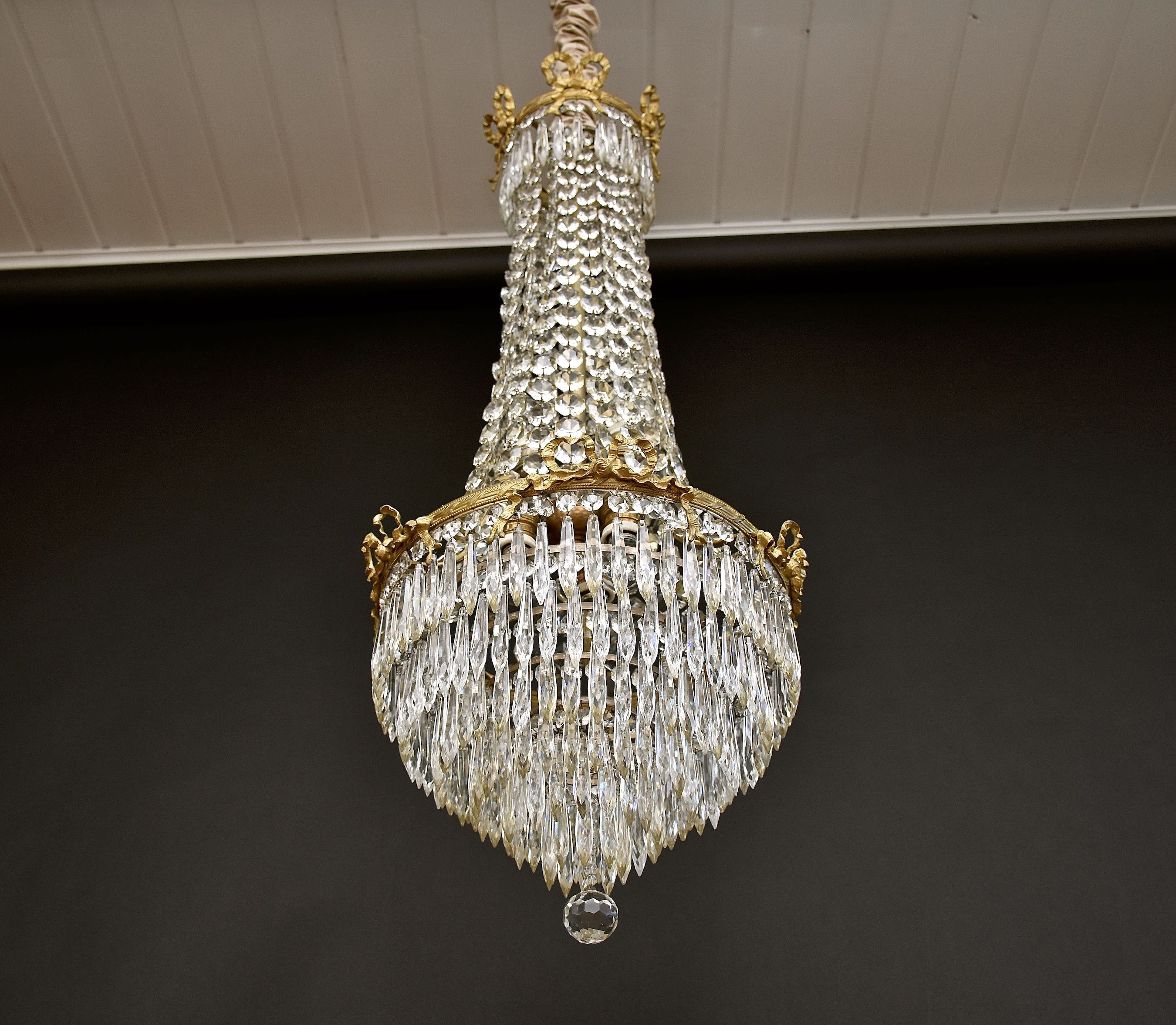 Late 19th c. French gilt bronze and crystal chandelier in the style of Louis XVI