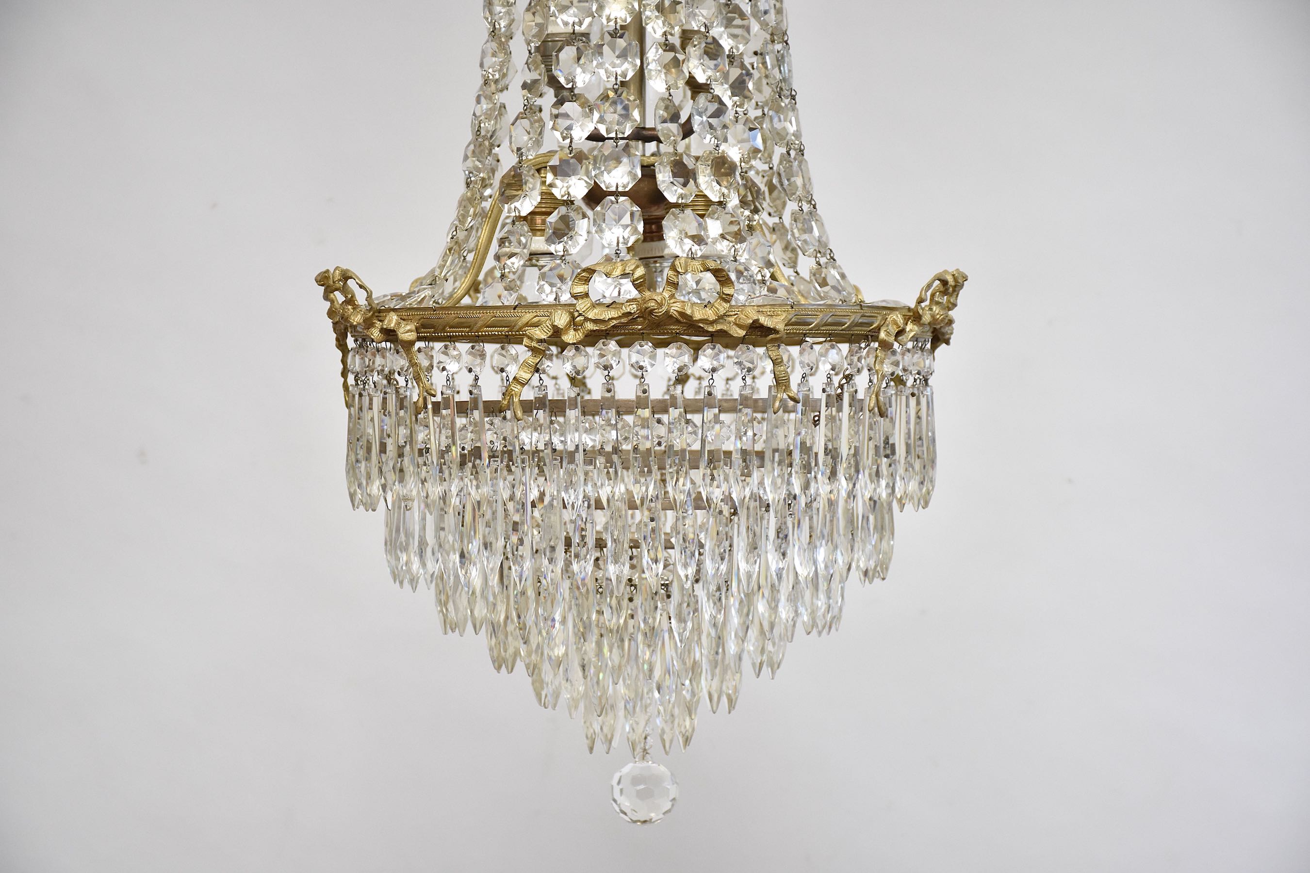 Late 19th c. French gilt bronze and crystal chandelier in the style of Louis XVI