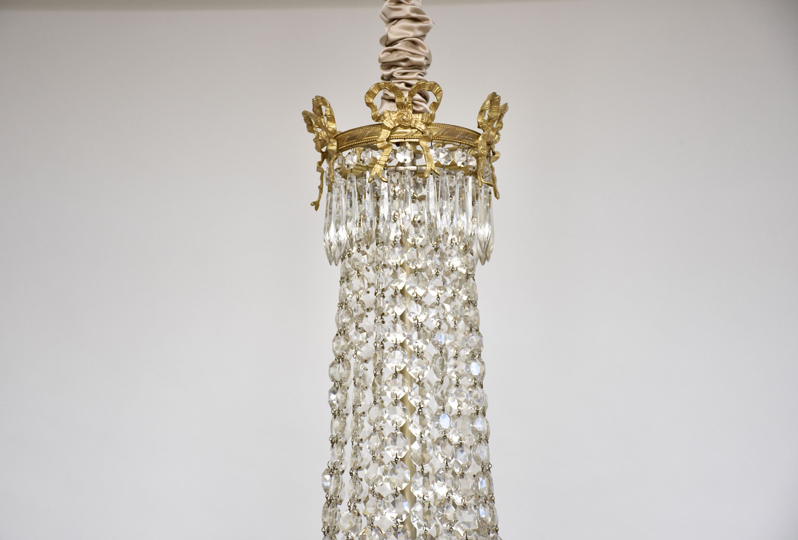 Late 19th c. French gilt bronze and crystal chandelier in the style of Louis XVI