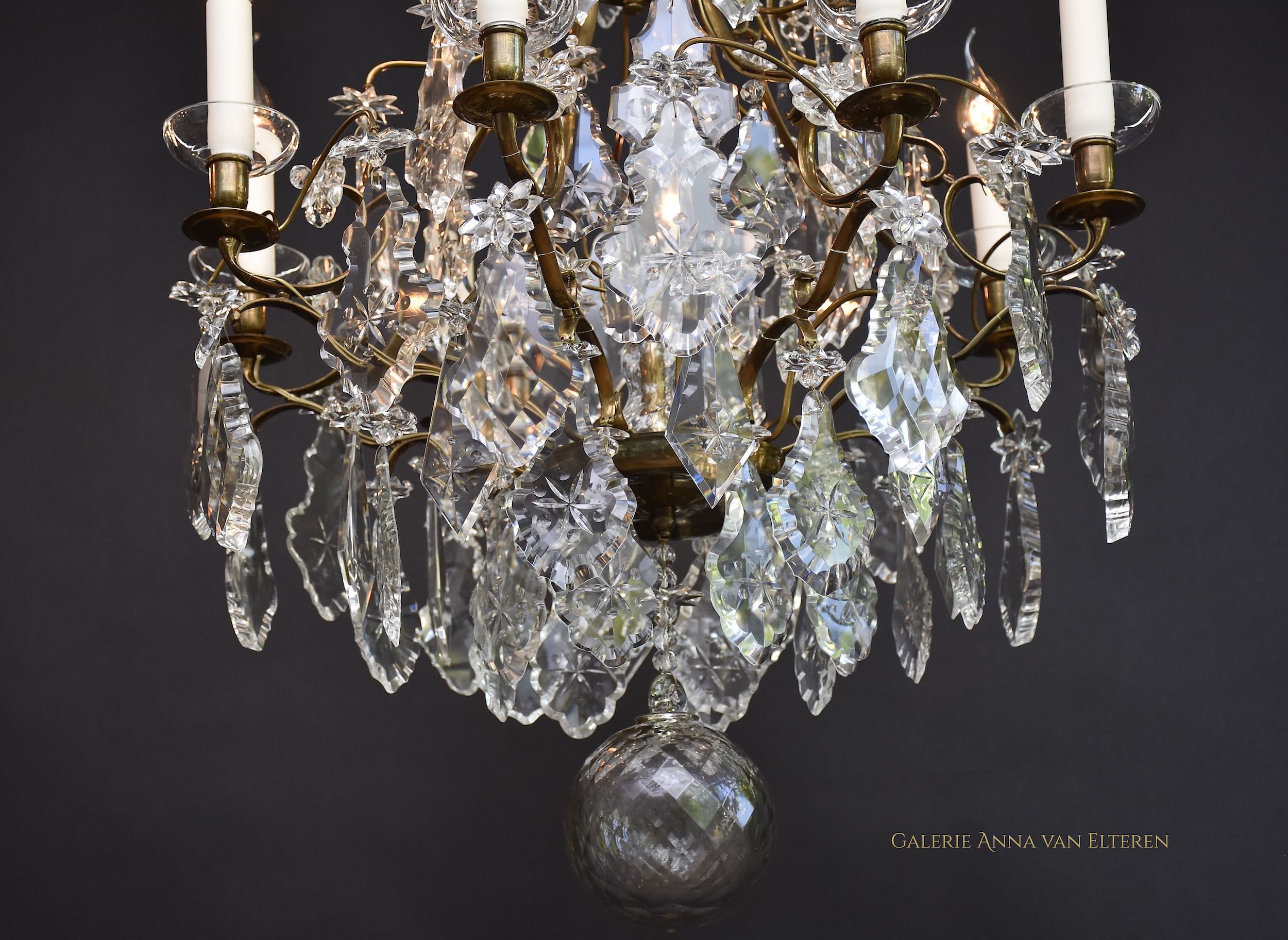 A pair of Rococo style crystal chandeliers