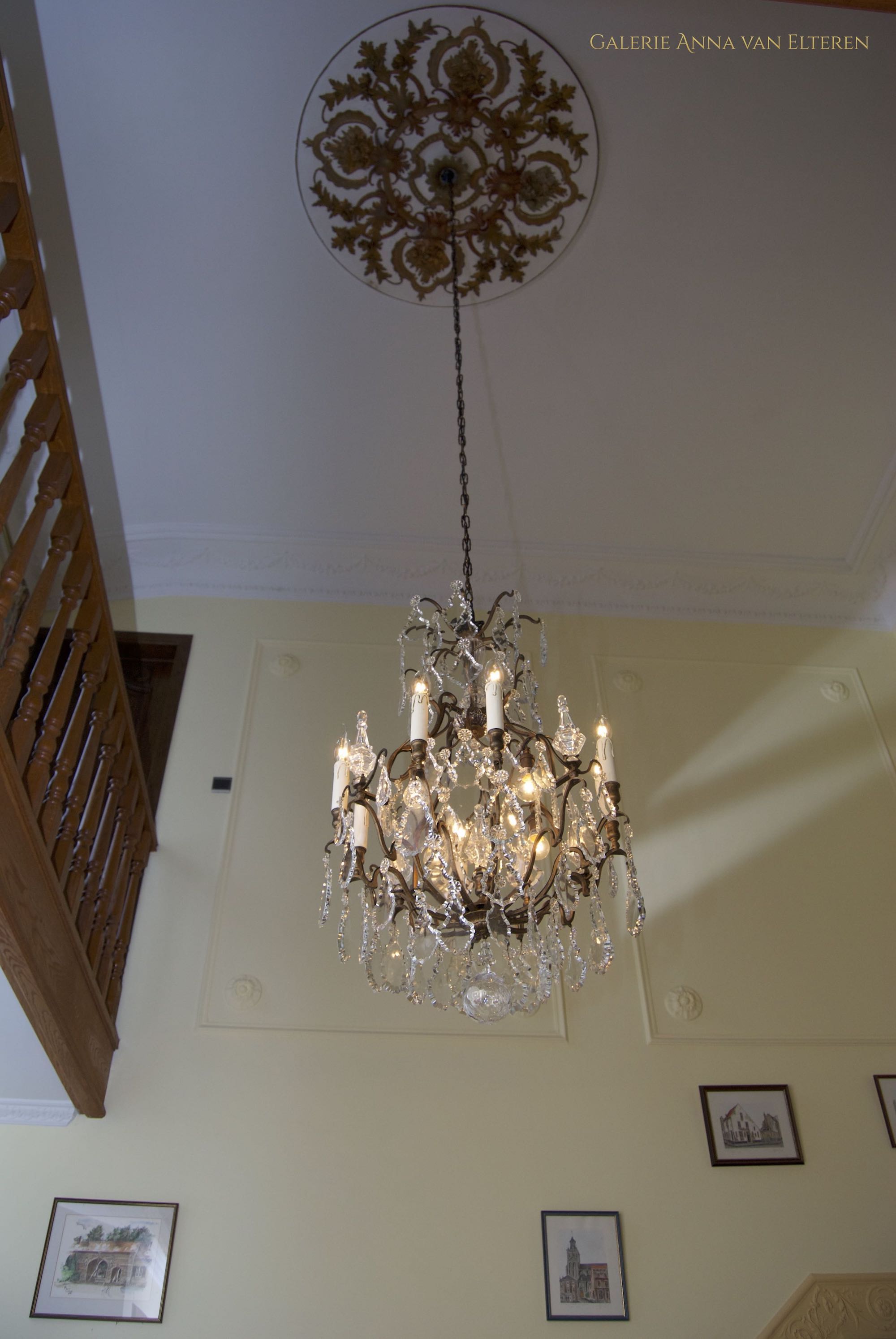 Antique French chandelier in the stairwell