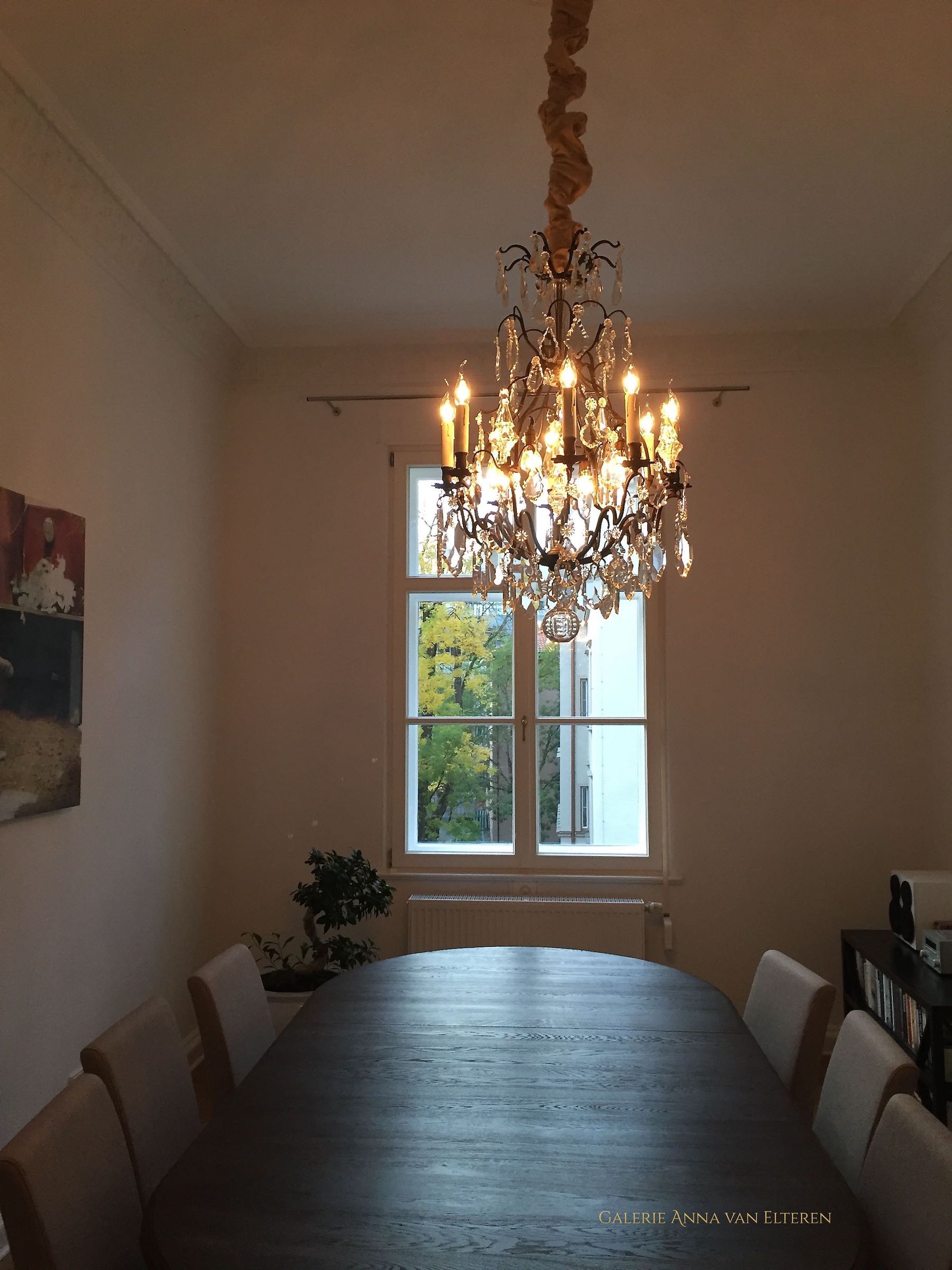 Antique French chandelier above a table
