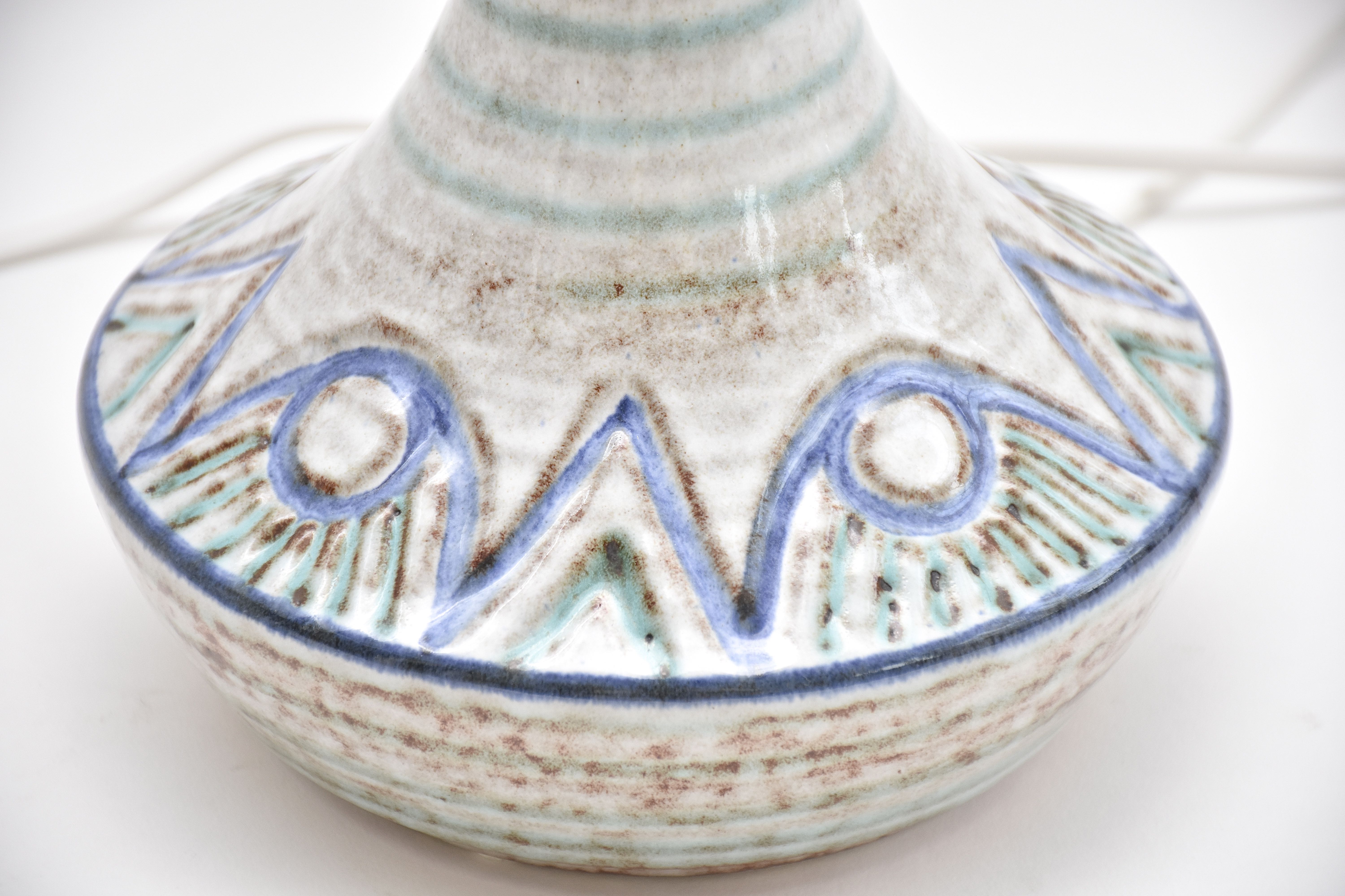 A pair of mid-century Danish ceramic table lamps in light blue/green by Soholm