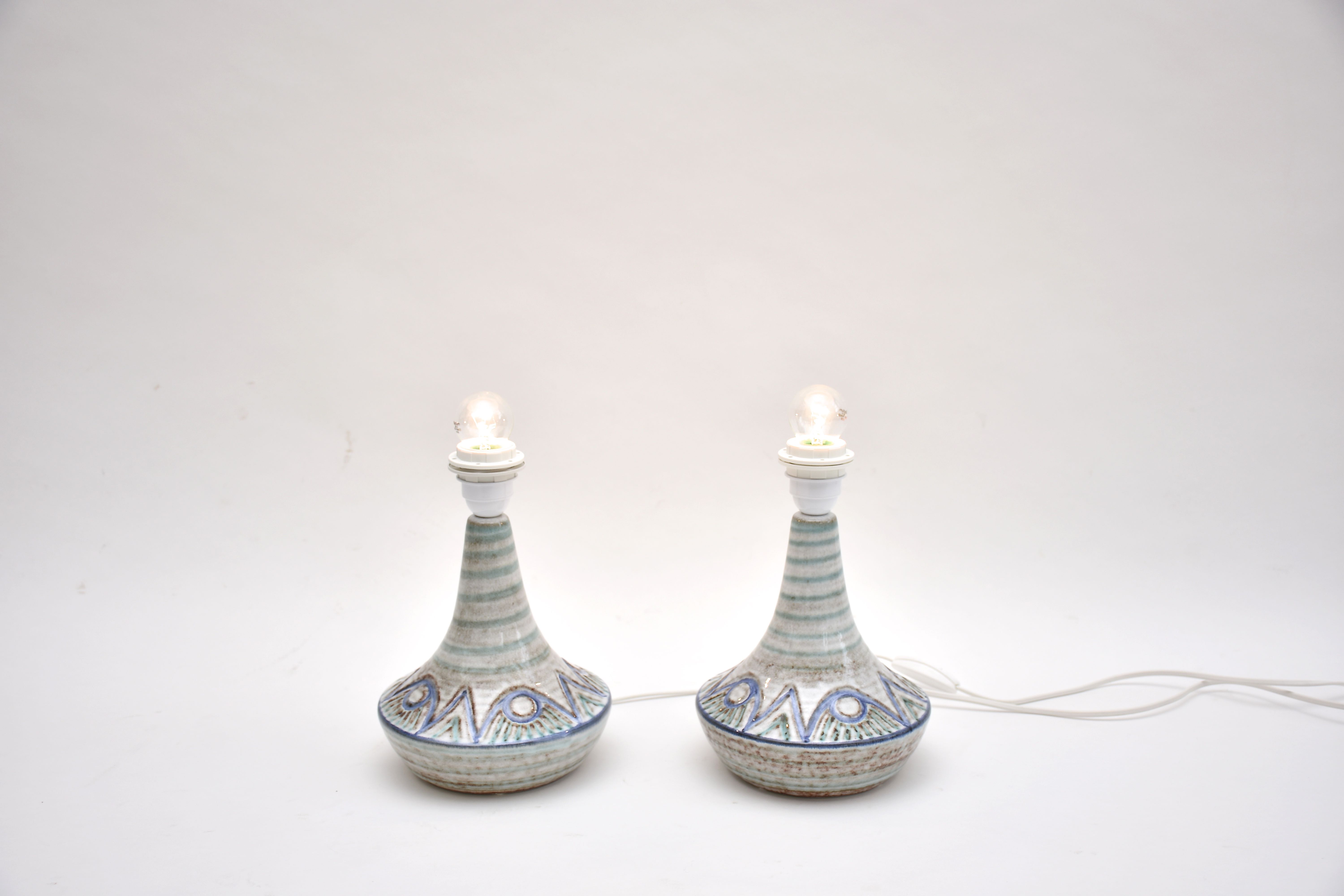 A pair of mid-century Danish ceramic table lamps in light blue/green by Soholm
